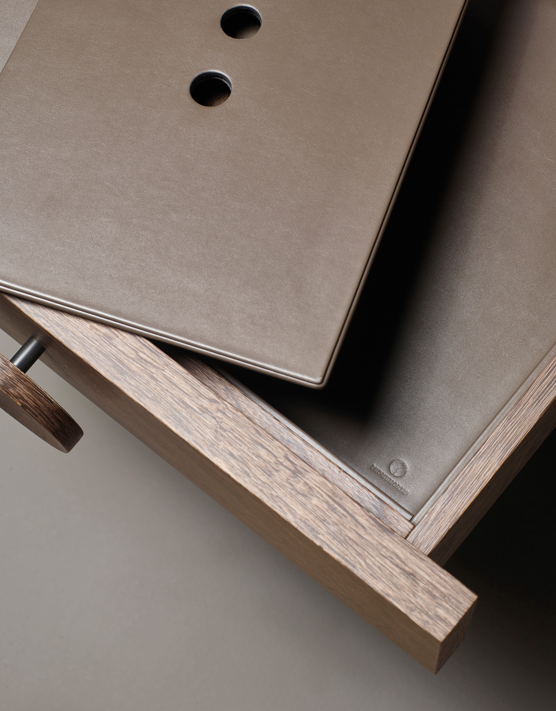 Drawers' detail of Dagoberto, a wooden bedside table with wheels and drawers from the Promemoria's catalogue | Promemoria