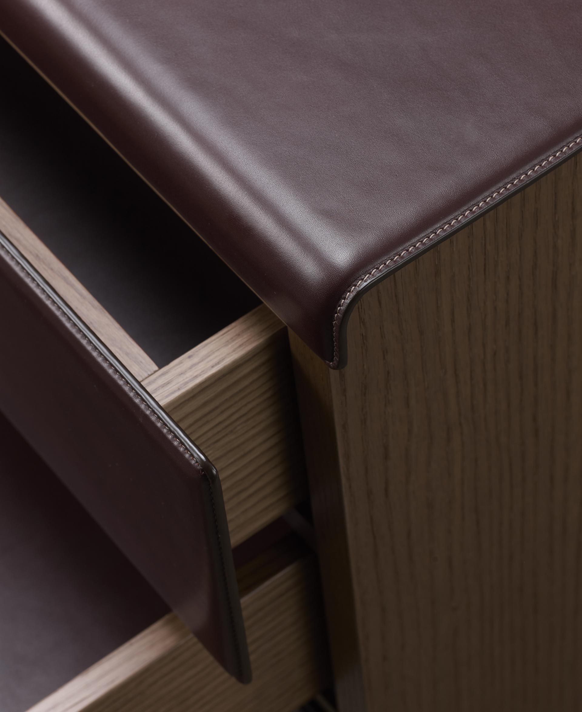 Orione is a wooden bedside table with drawers from the Promemoria's catalogue | Promemoria
