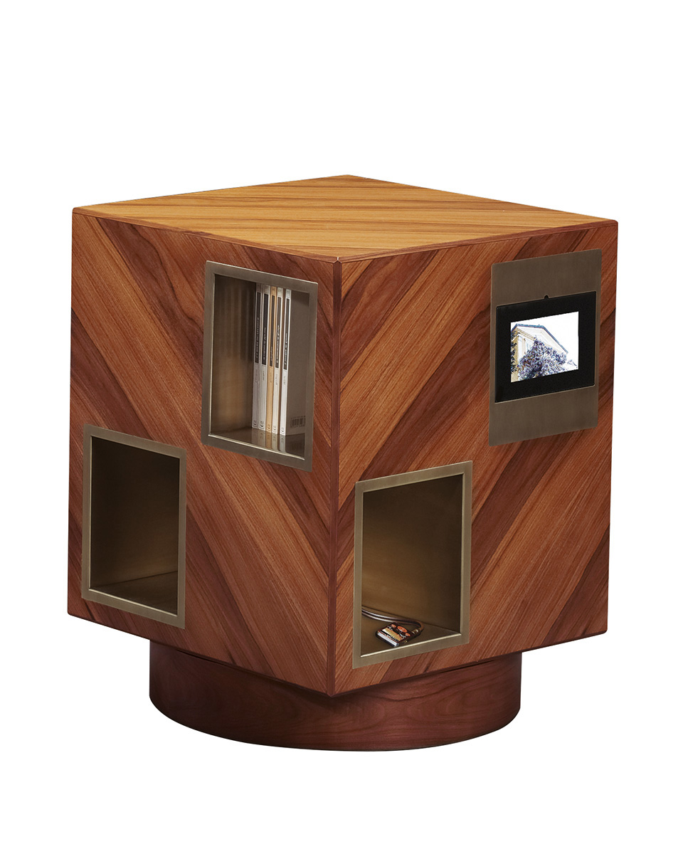 Meryl is a revolving wooden bookcase with bronze compartments from the Promemoria's catalogue | Promemoria