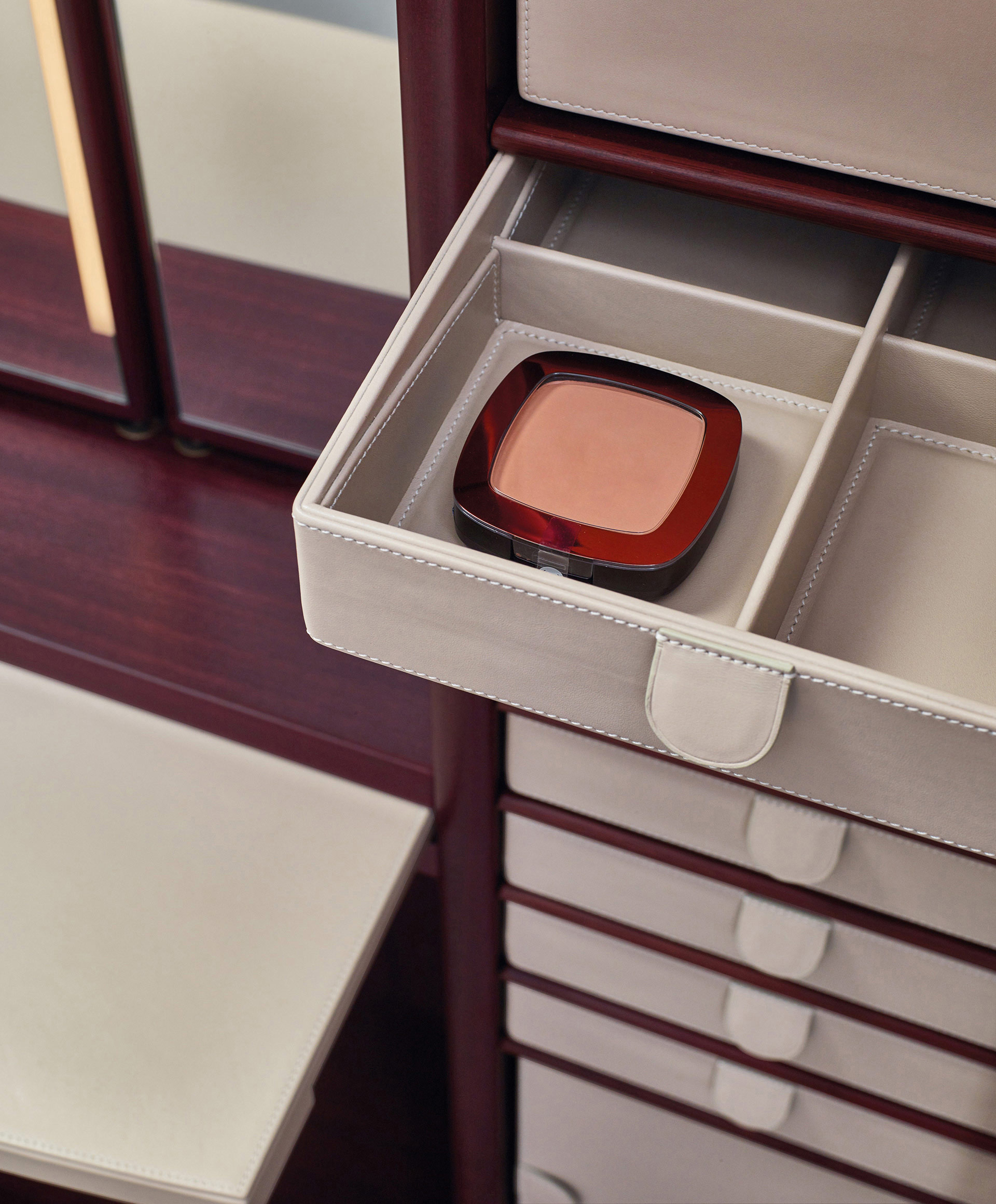 Detail of internal accessories of Alchemico Lui e Lei, two wooden cabinets with bronze details and several internal accessories, from Promemoria's collection Amaranthine Tales | Promemoria