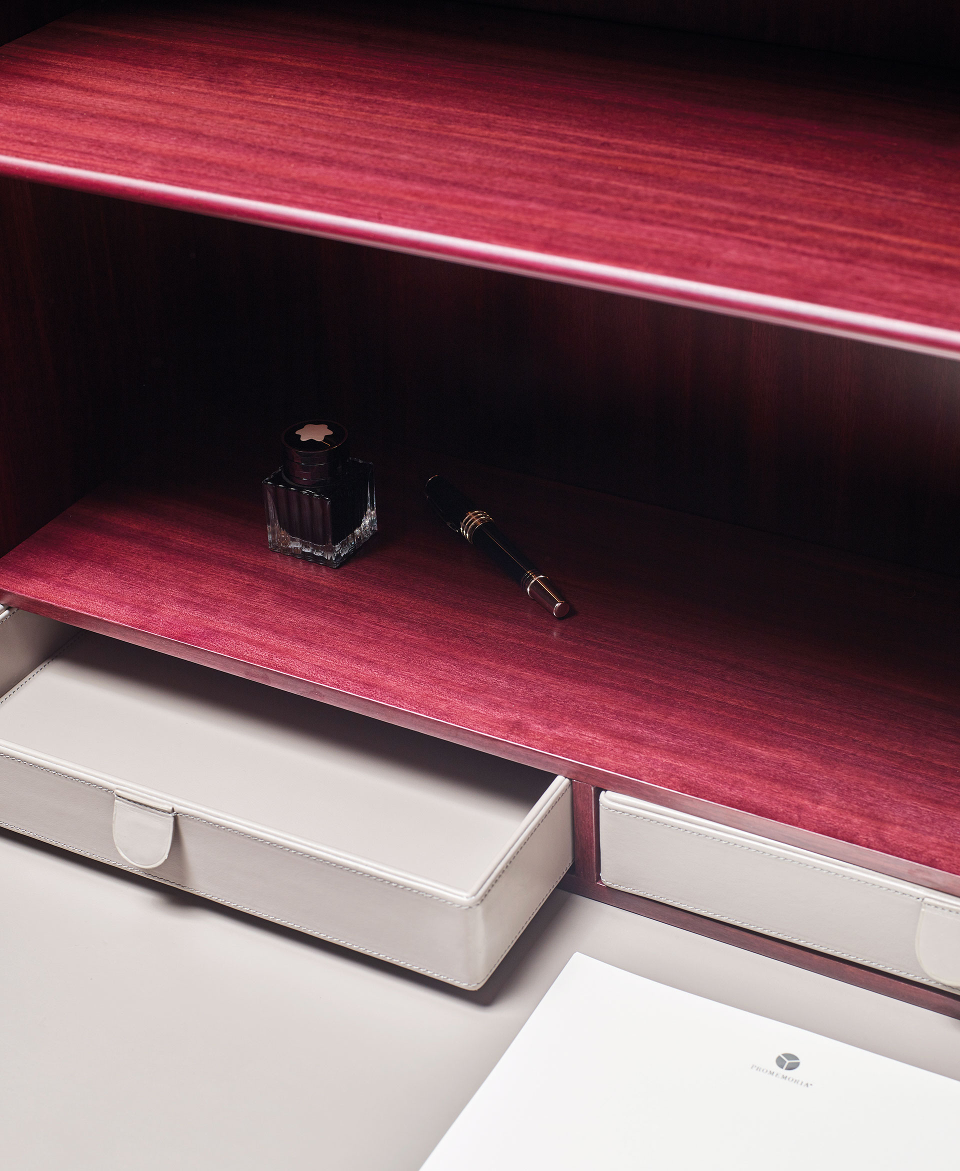 Detail of internal accessories of Alchemico Lui e Lei, two wooden cabinets with bronze details and several internal accessories, from Promemoria's collection Amaranthine Tales | Promemoria