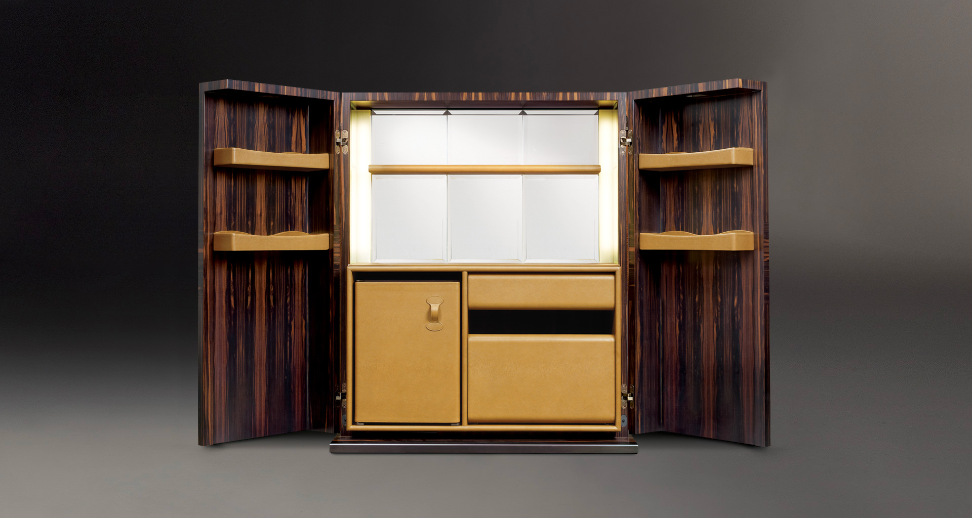 Inside of Bacco, a wooden cabinet-bar with several accessories inside and bronze base, profiles and handles, from Promemoria's catalogue | Promemoria