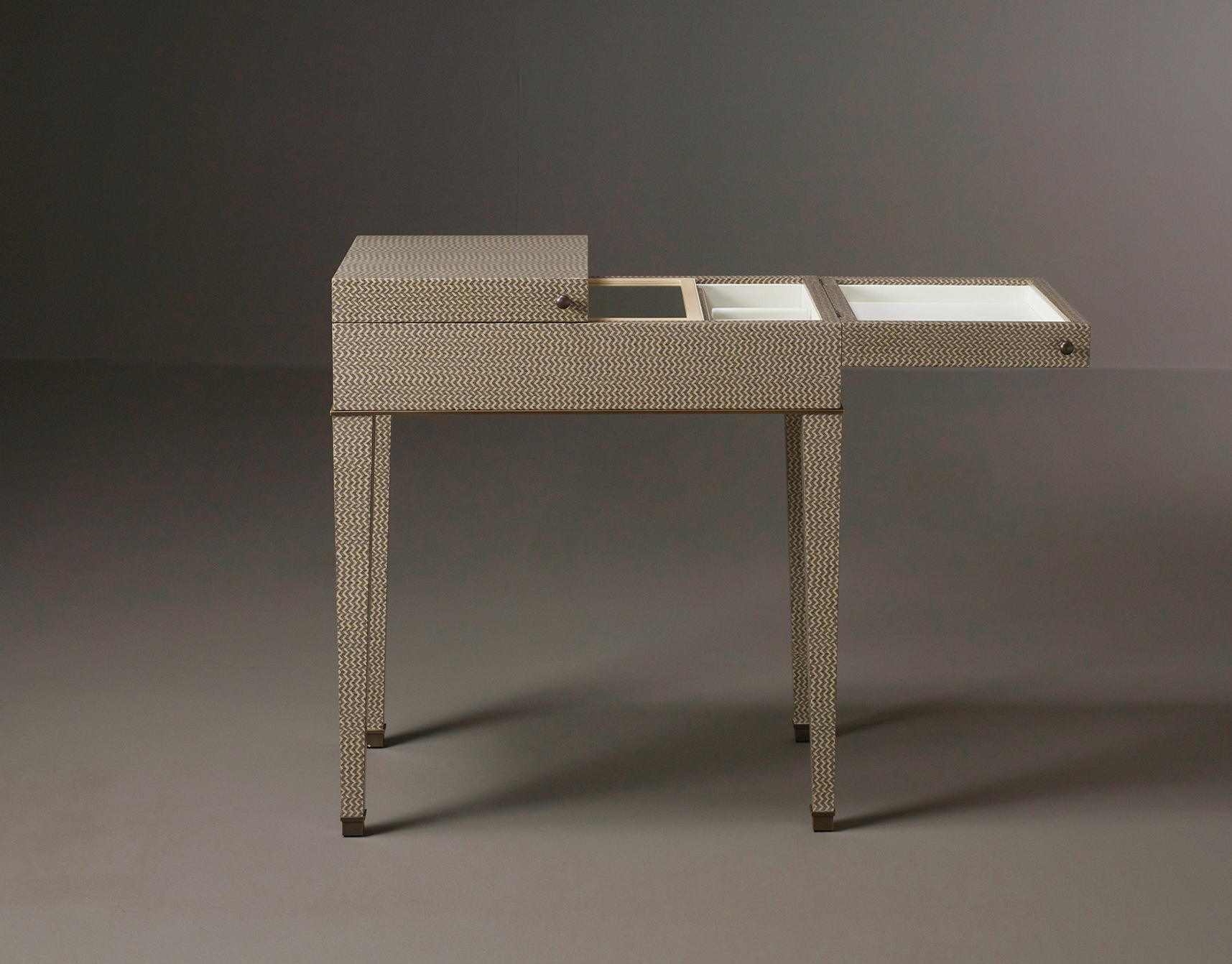 Kalypso is a wooden cabinet with bronze and leather details from Promemoria's collection Amaranthine Tales | Promemoria