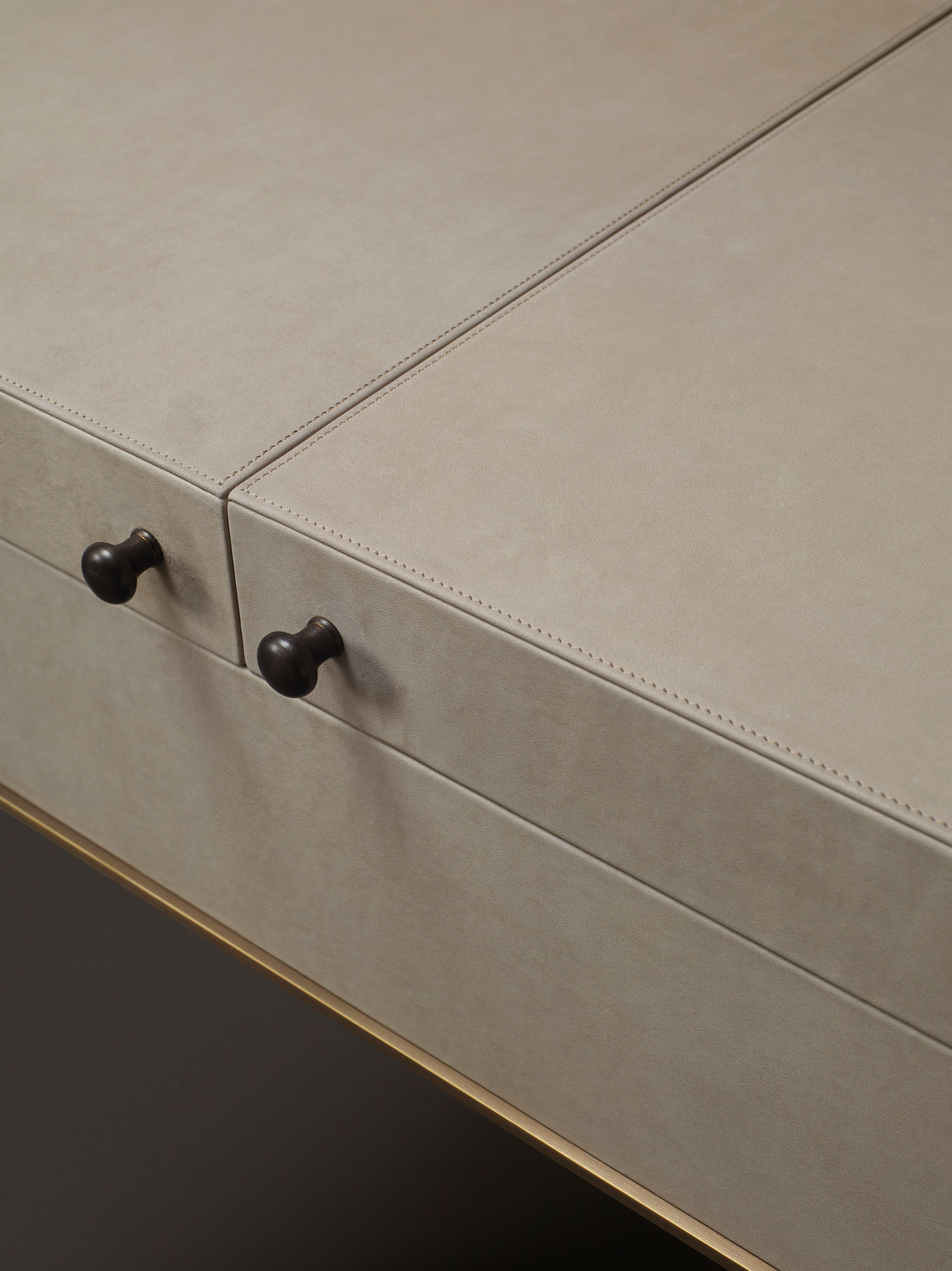 Handles' detail of Kalypso, a wooden cabinet with bronze and leather details from Promemoria's collection Amaranthine Tales | Promemoria