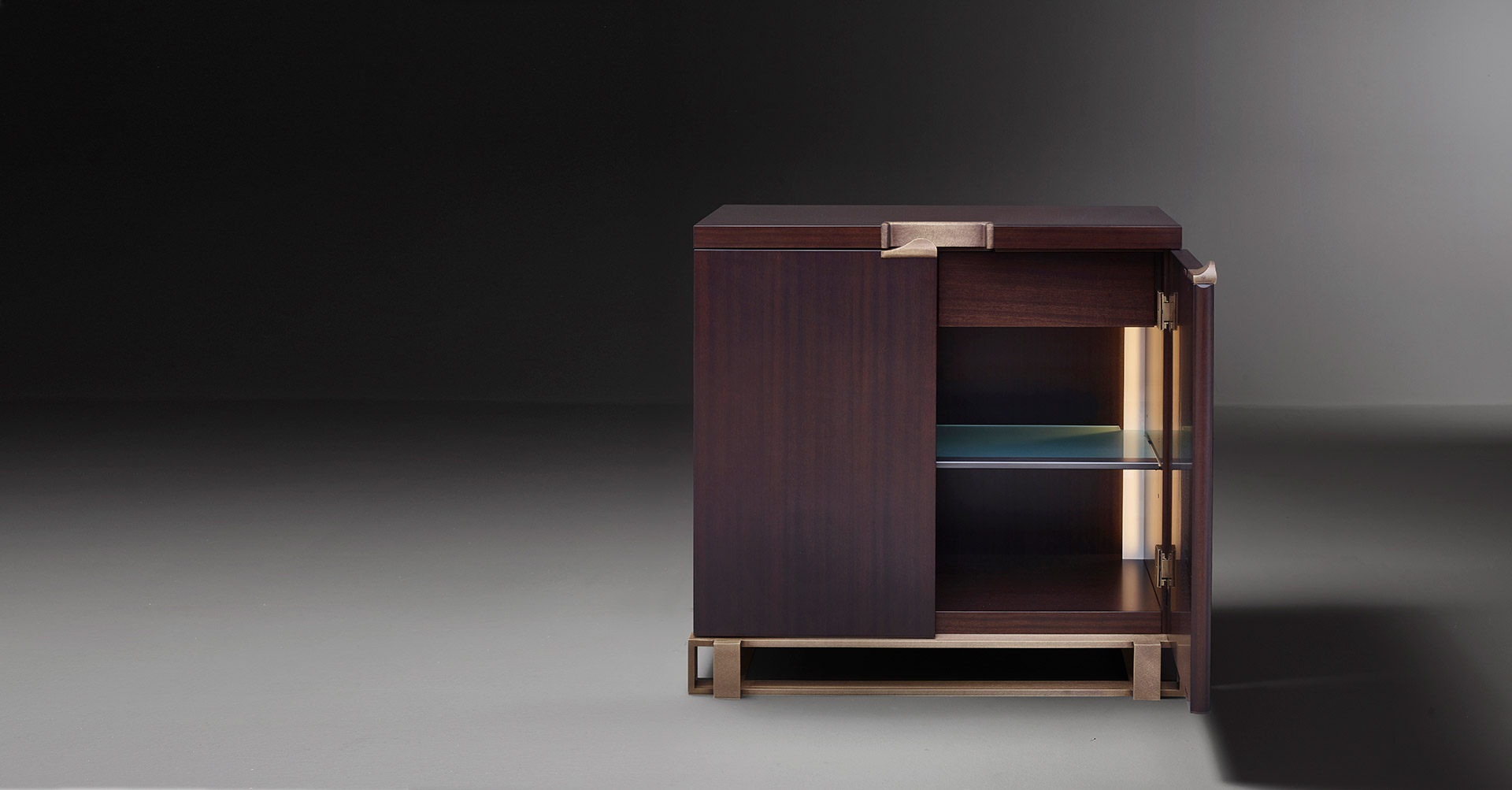 Inside of Margot, a wooden cabinet with bronze base, handle and hinges from Promemoria's catalogue | Promemoria