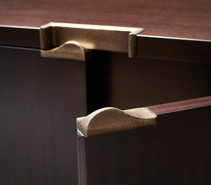 Margot is a wooden cabinet with bronze base, handle and hinges from Promemoria's catalogue | Promemoria
