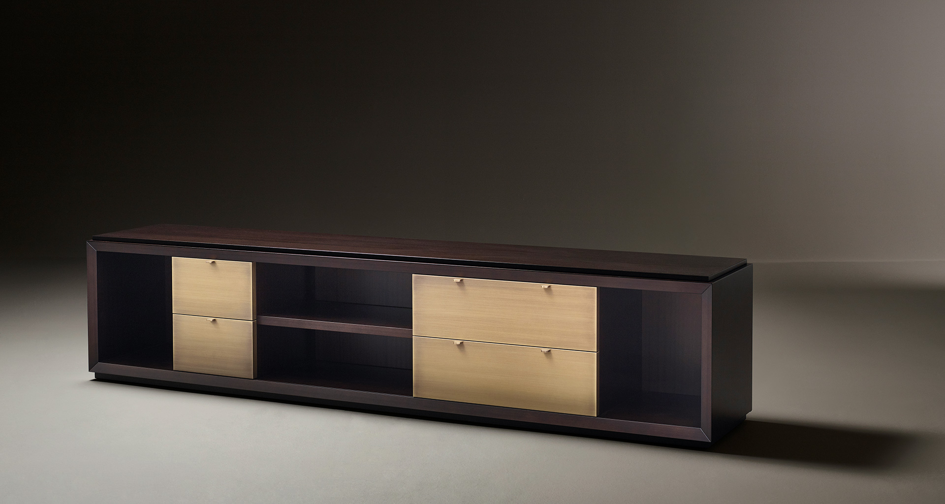 Nightwood is a wooden low cabinet with drawers with bronze details and leather placemats from Promemoria's Amaranthine Tales collection | Promemoria