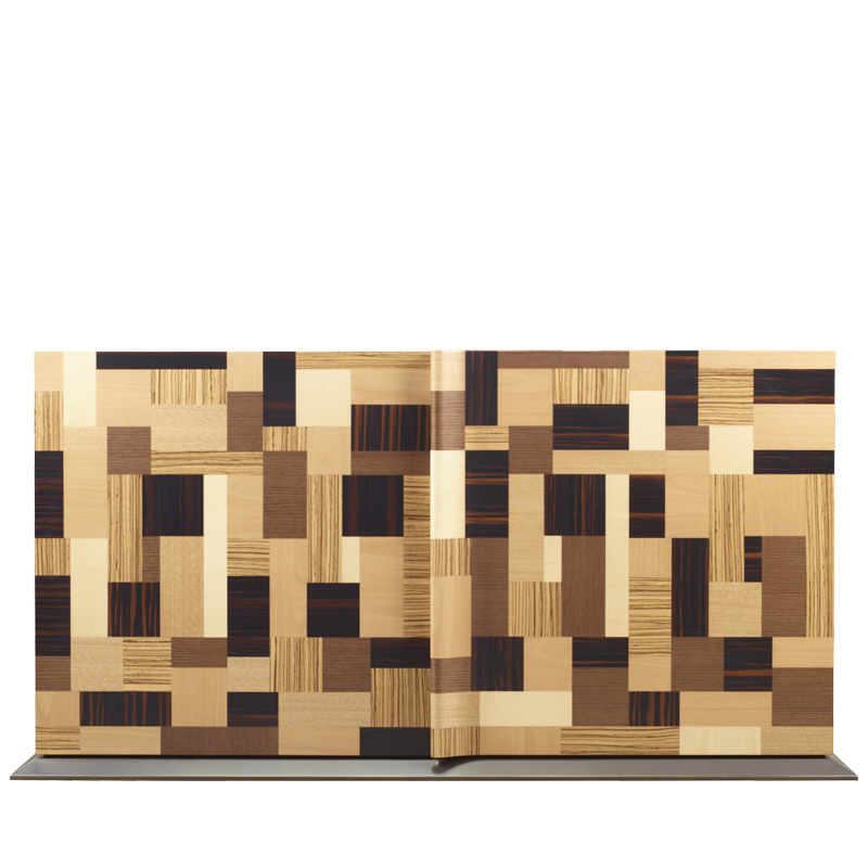 Oleandra is a wooden cabinet that can have a geometric patchwork design with light and dark woods interweaved and bronze details from Promemoria's catalogue | Promemoria
