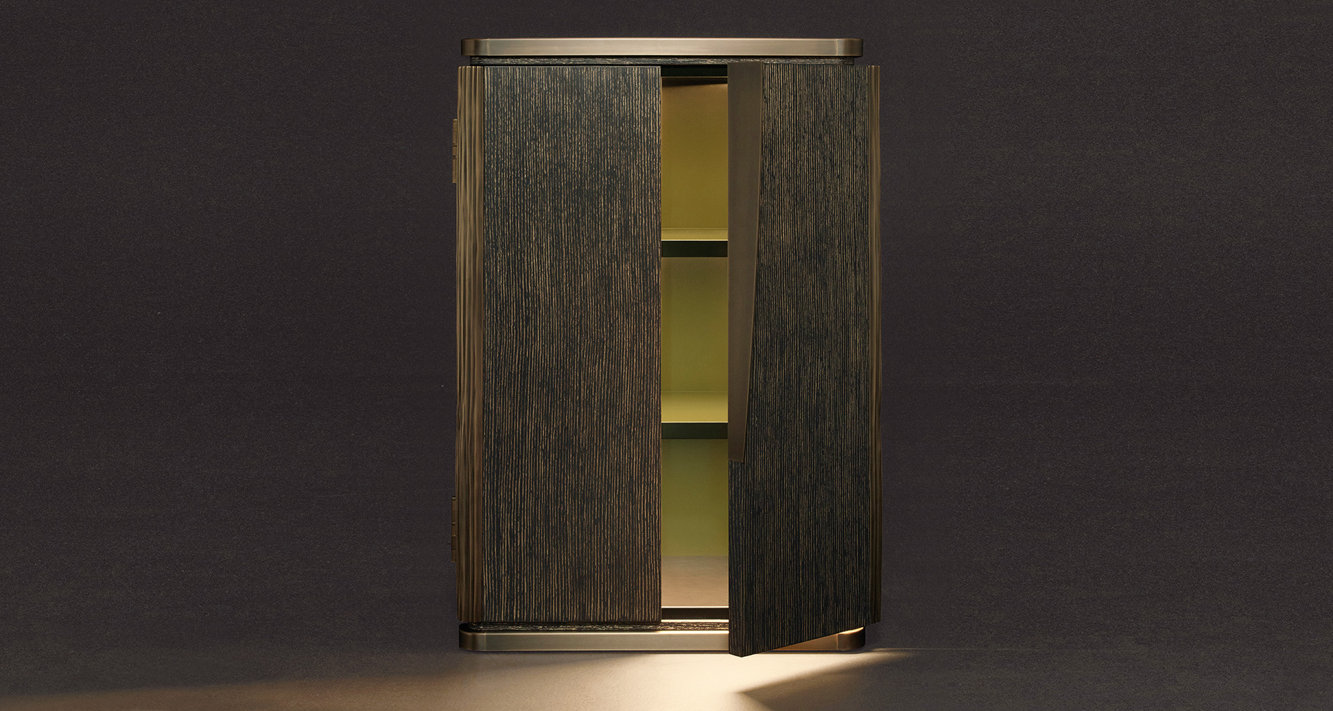 Soho is a cabinet in gold brushed stained blue oak with bronze details, from Promemoria's The London Collection | Promemoria