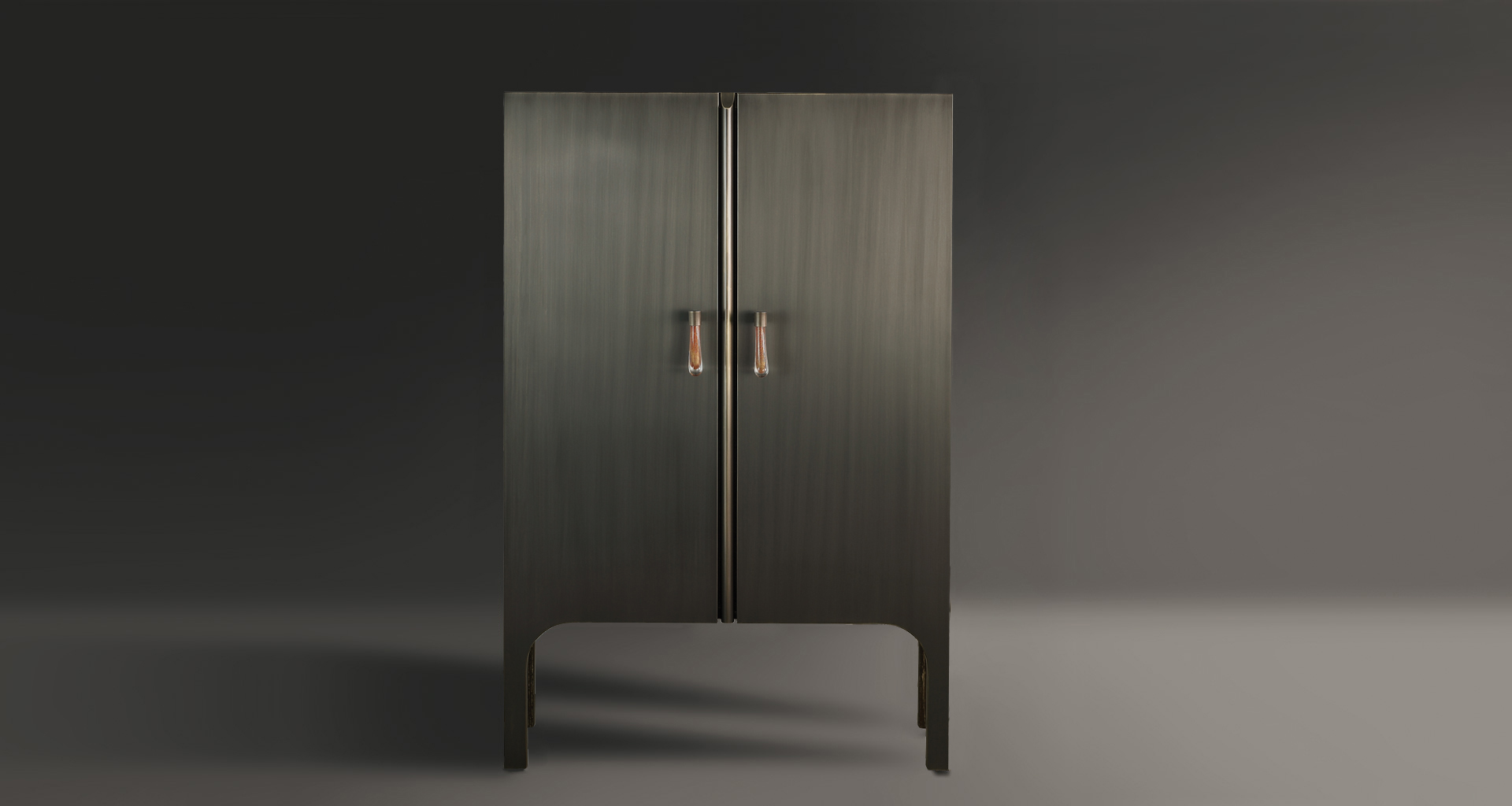 Inside of Tom Bombadil, a wooden cabinet with bronze profiles and a Murano glass handle, from Promemoria's catalogue | Promemoria