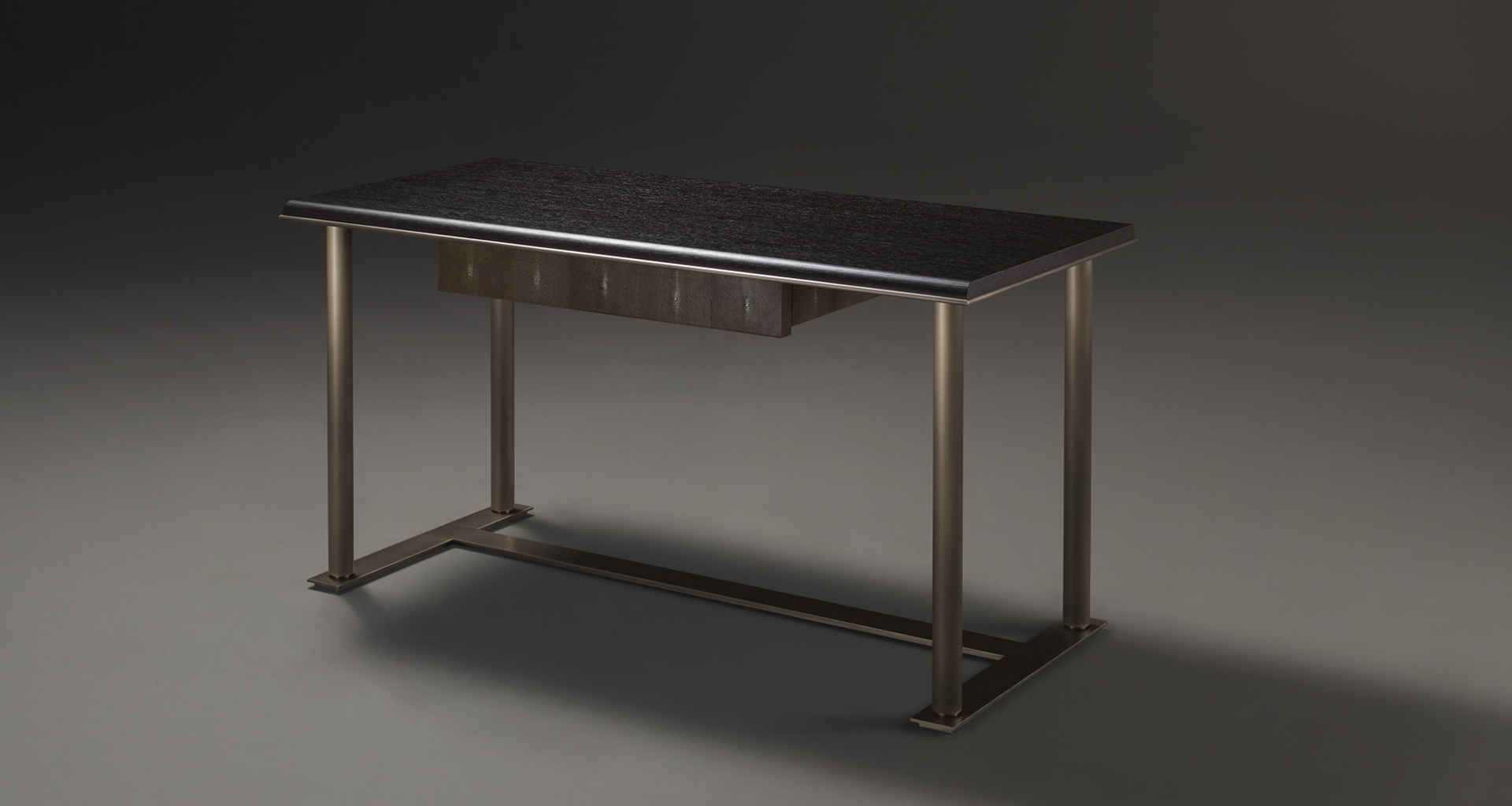 Galadriel is an essential writing desk with bronze structure and wooden tops and drawers from the Promemoria's catalogue | Promemoria