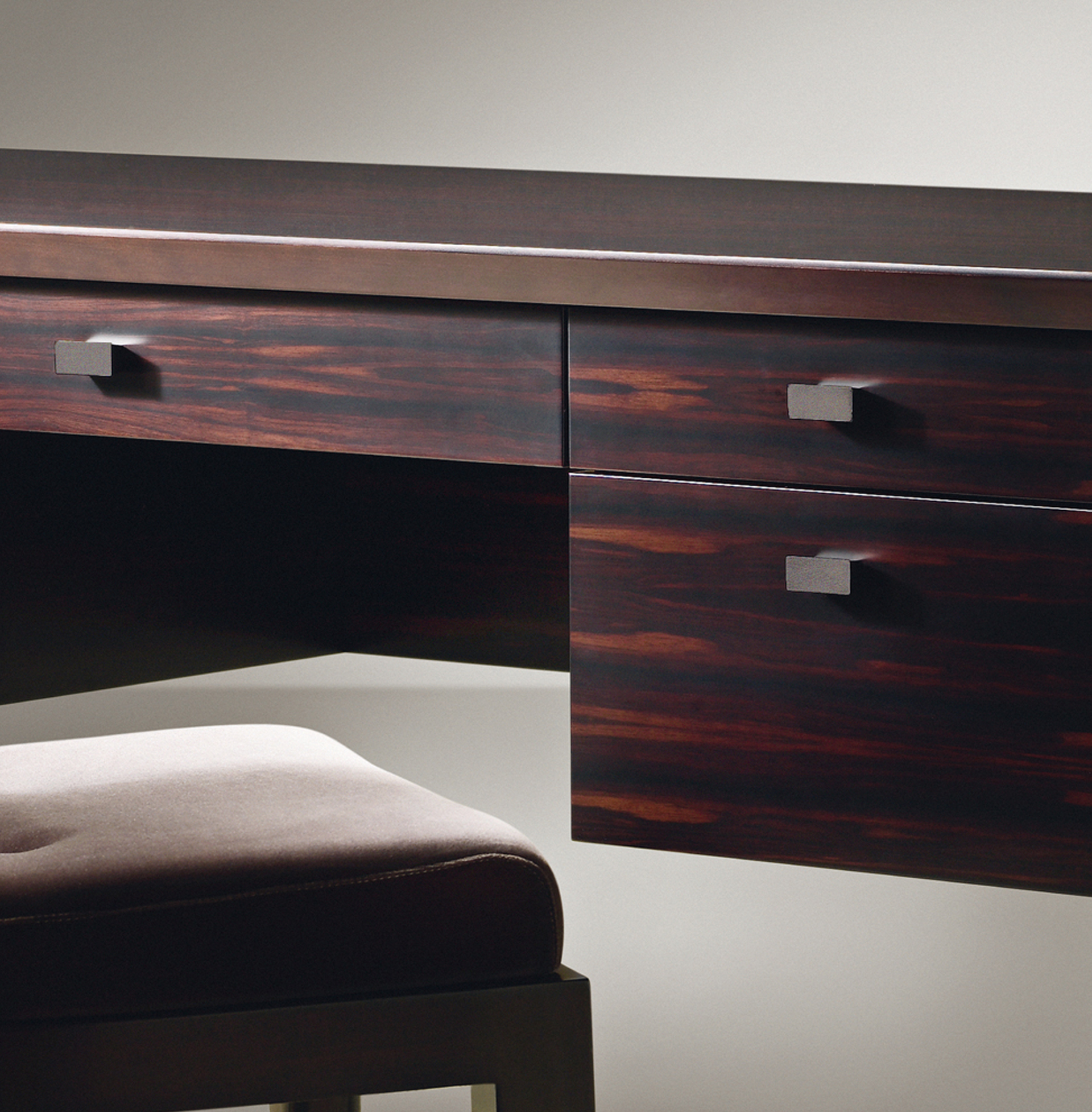 Theo is a wooden writing desk that can be covered in leather with leather details or with bronze details from the Promemoria's catalogue | Promemoria
