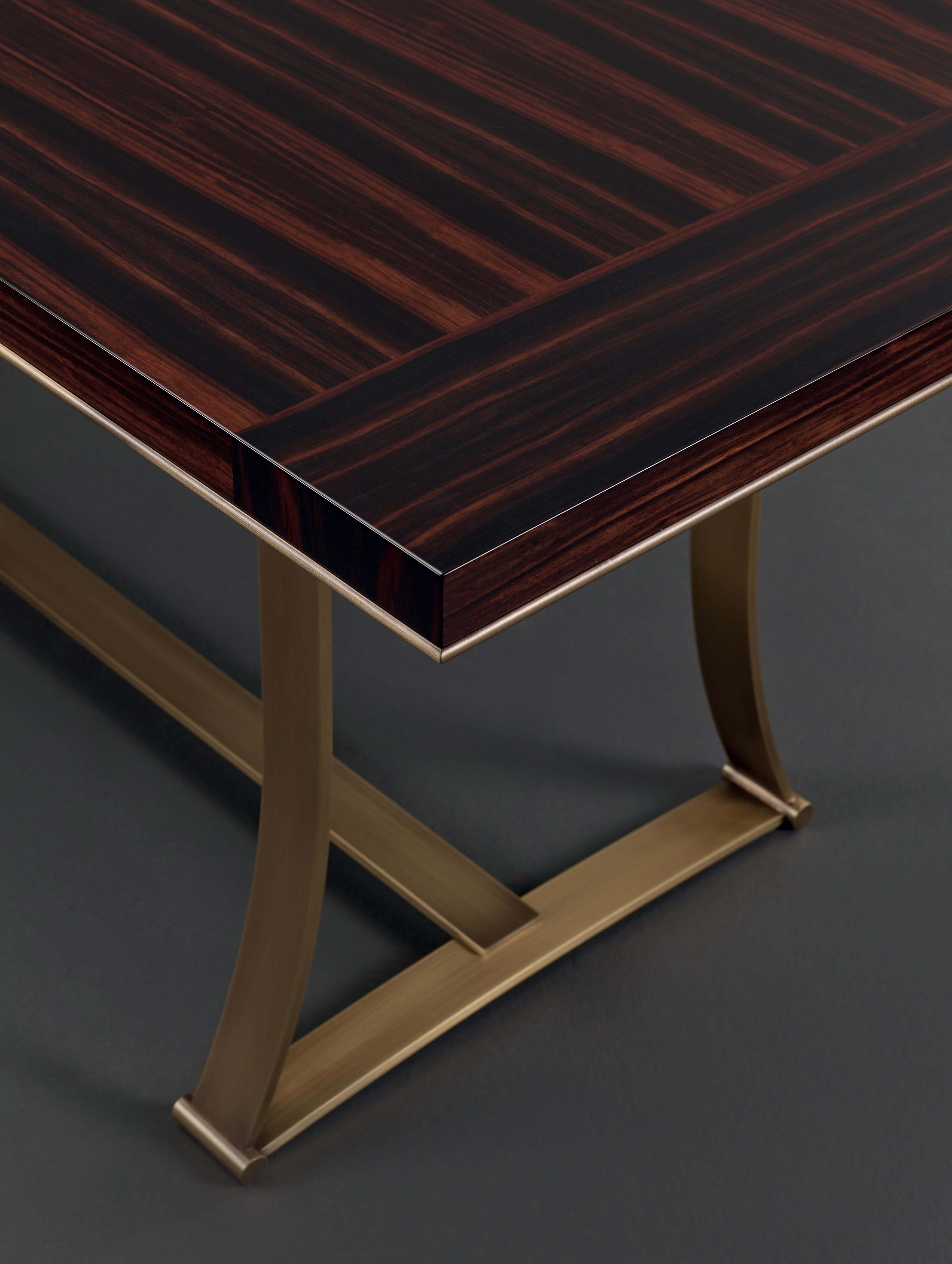Victor is a table with bronze structure from the Promemoria's catalogue | Promemoria