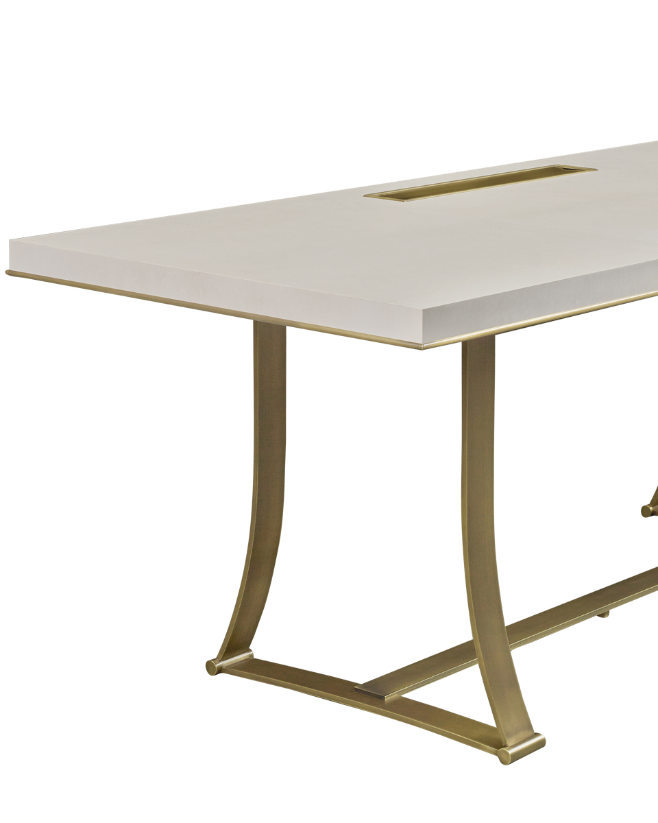 Detail of Victor, a table with bronze structure and a writing desk in bronze and morado wood from the Promemoria's catalogue | Promemoria