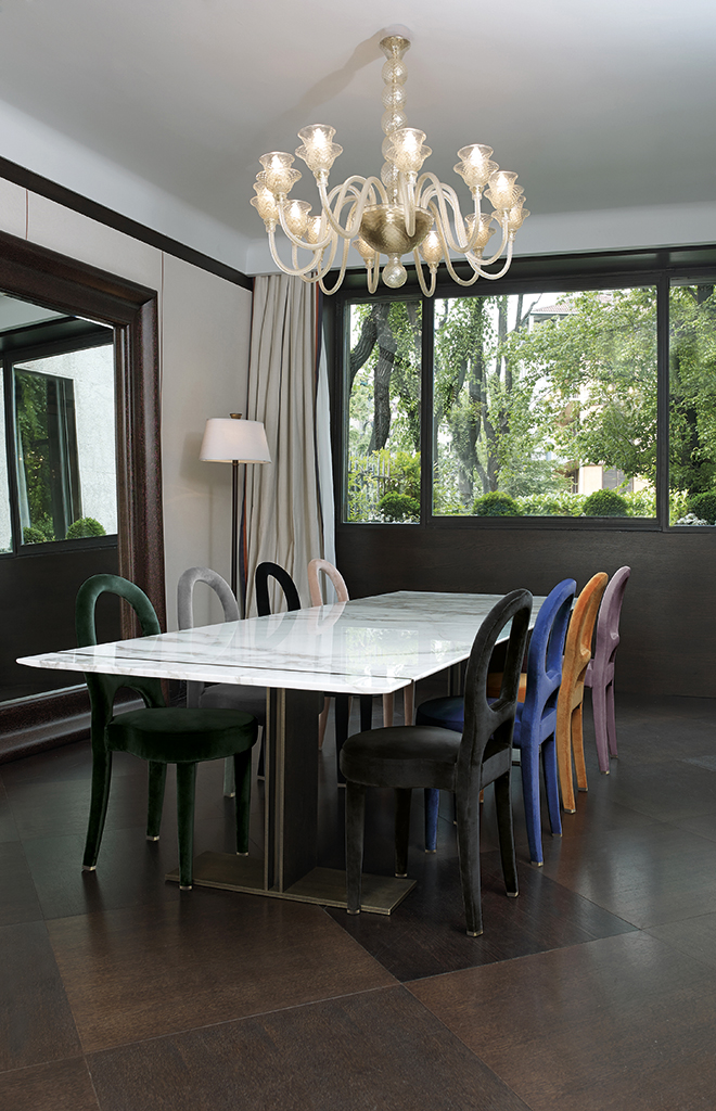 Bilou Bilou is a dining chair covered in velvet and linen or nappa leather available in different colors and in the versions standard, large and kids. Bilou Bilou is the most iconic dining chair from Promemoria's catalogue | Promemoria