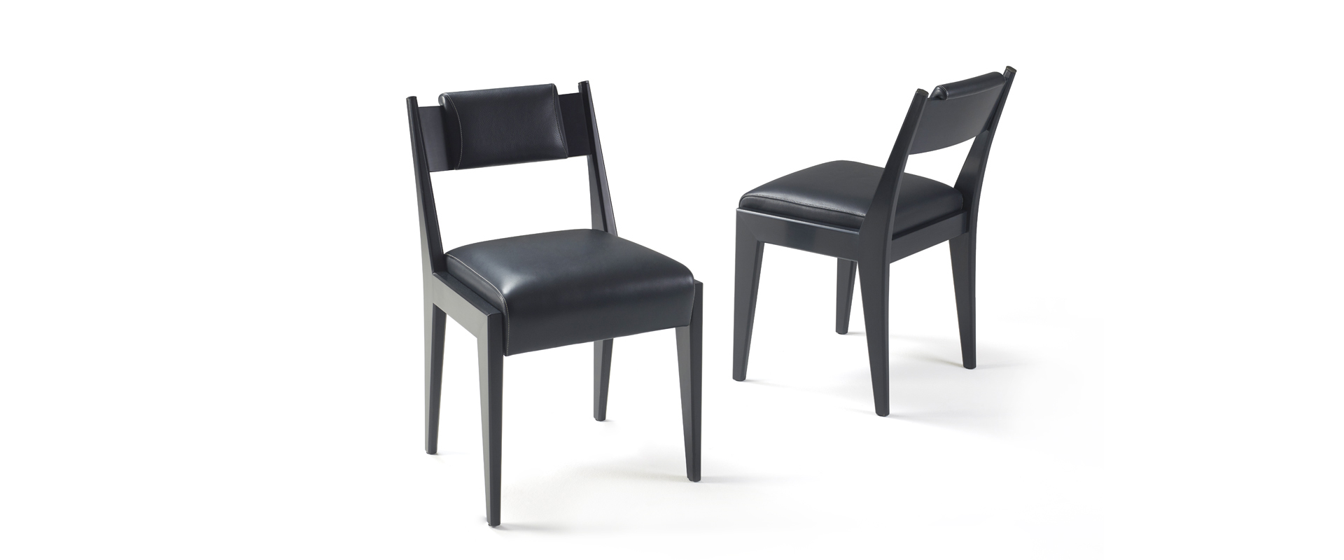 /mediaIris%20is%20a%20wooden%20chair%20with%20bronze%20details%20and%20leather%20cushions,%20from%20Promemoria's%20Indigo%20Tales%20|%20Promemoria
