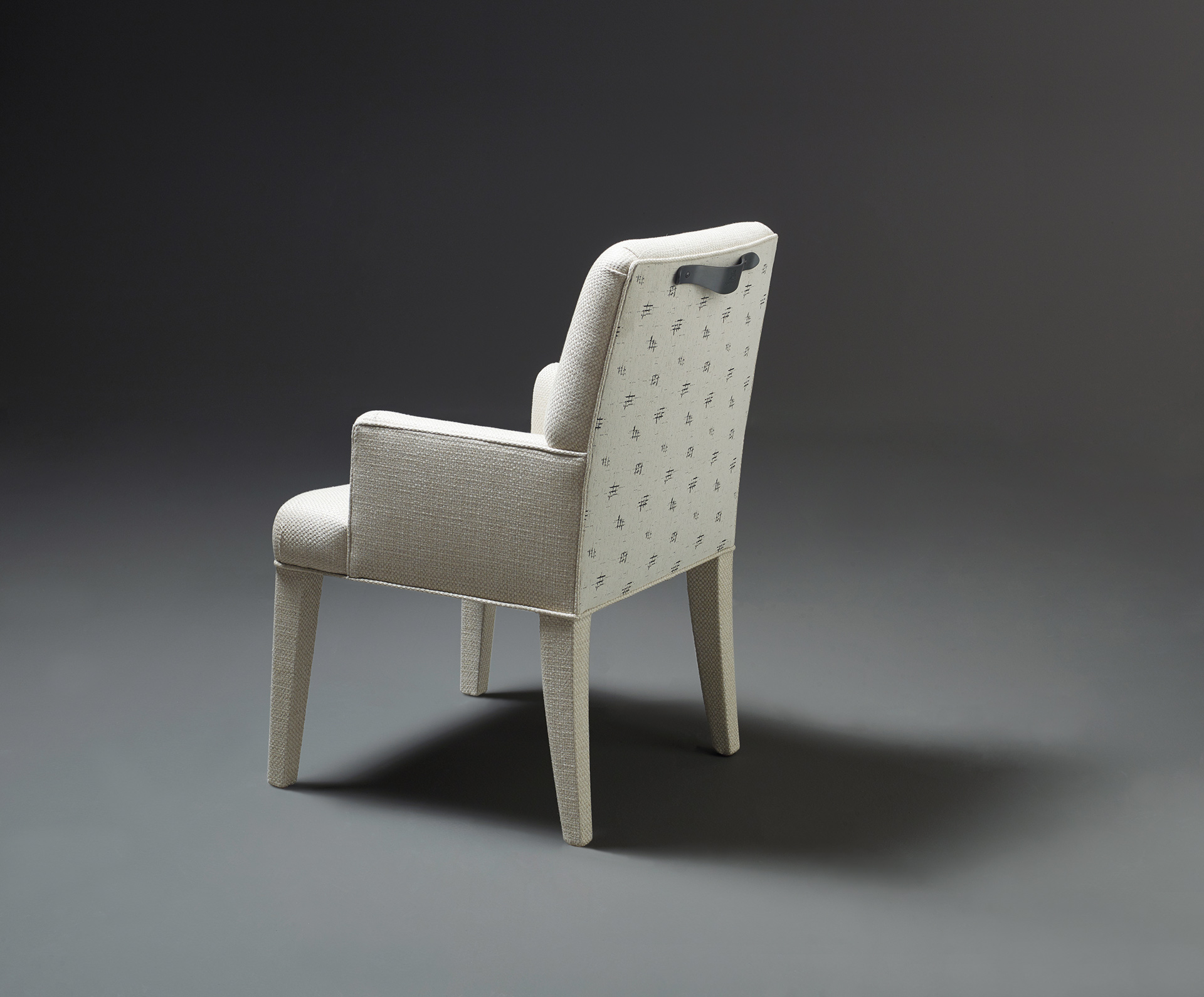 Isotta is a wooden dining chair with or without armrests and with a fabric or leather covered back, from Promemoria's catalogue | Promemoria