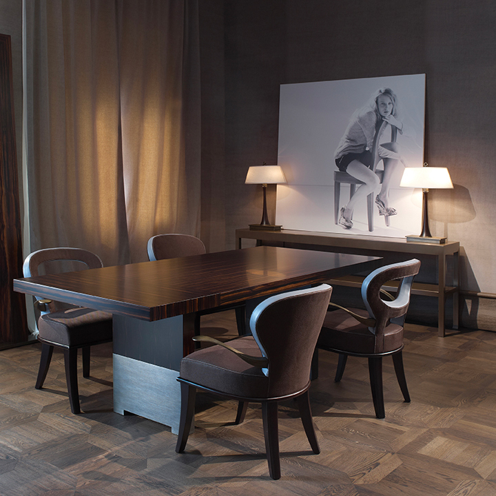 Moka e Roka are two wooden chairs covered in fabric and leather, with or without bronze armrests, from Promemoria's catalogue | Promemoria