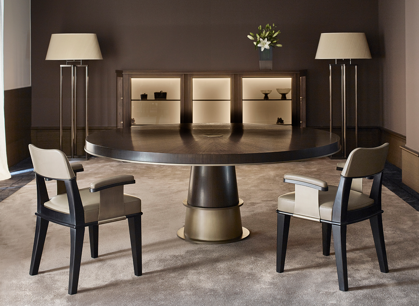 Vespertine is a wooden dining chair with leather seat and back and with or without armrests with bronze details, from Promemoria's Night Tales collection | Promemoria