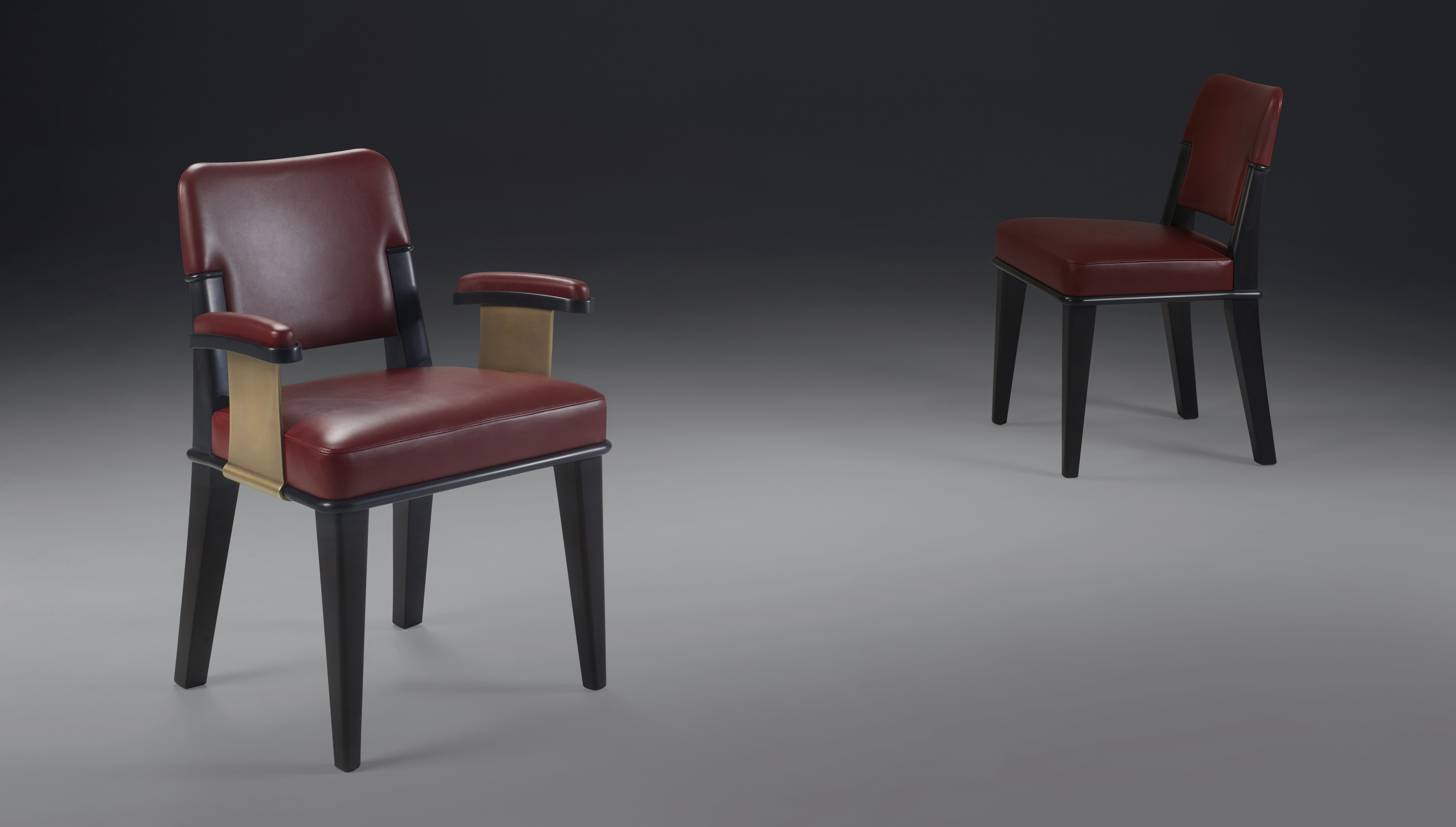 Vespertine is a wooden dining chair with leather seat and back and with or without armrests with bronze details, from Promemoria's Night Tales collection | Promemoria
