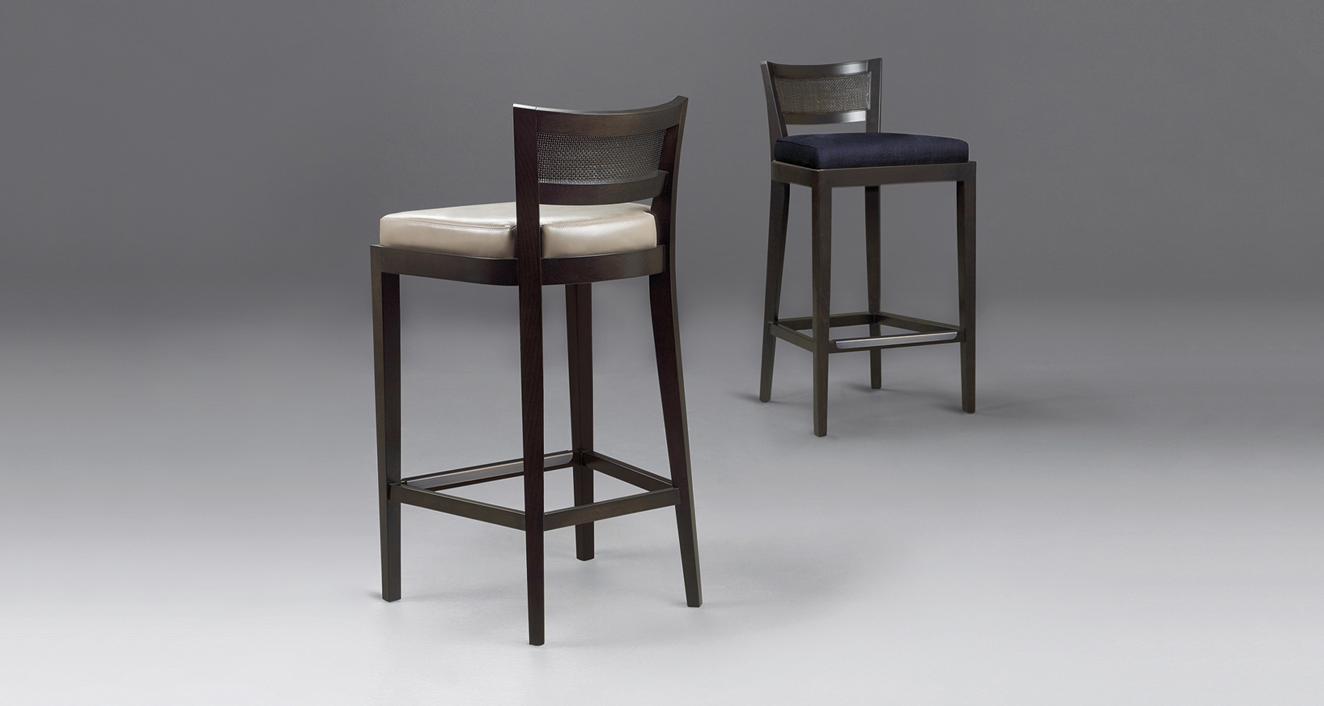 Detail of Caffè, a wooden stool with straw back and fabric or leather seat, from Promemoria's catalogue | Promemoria