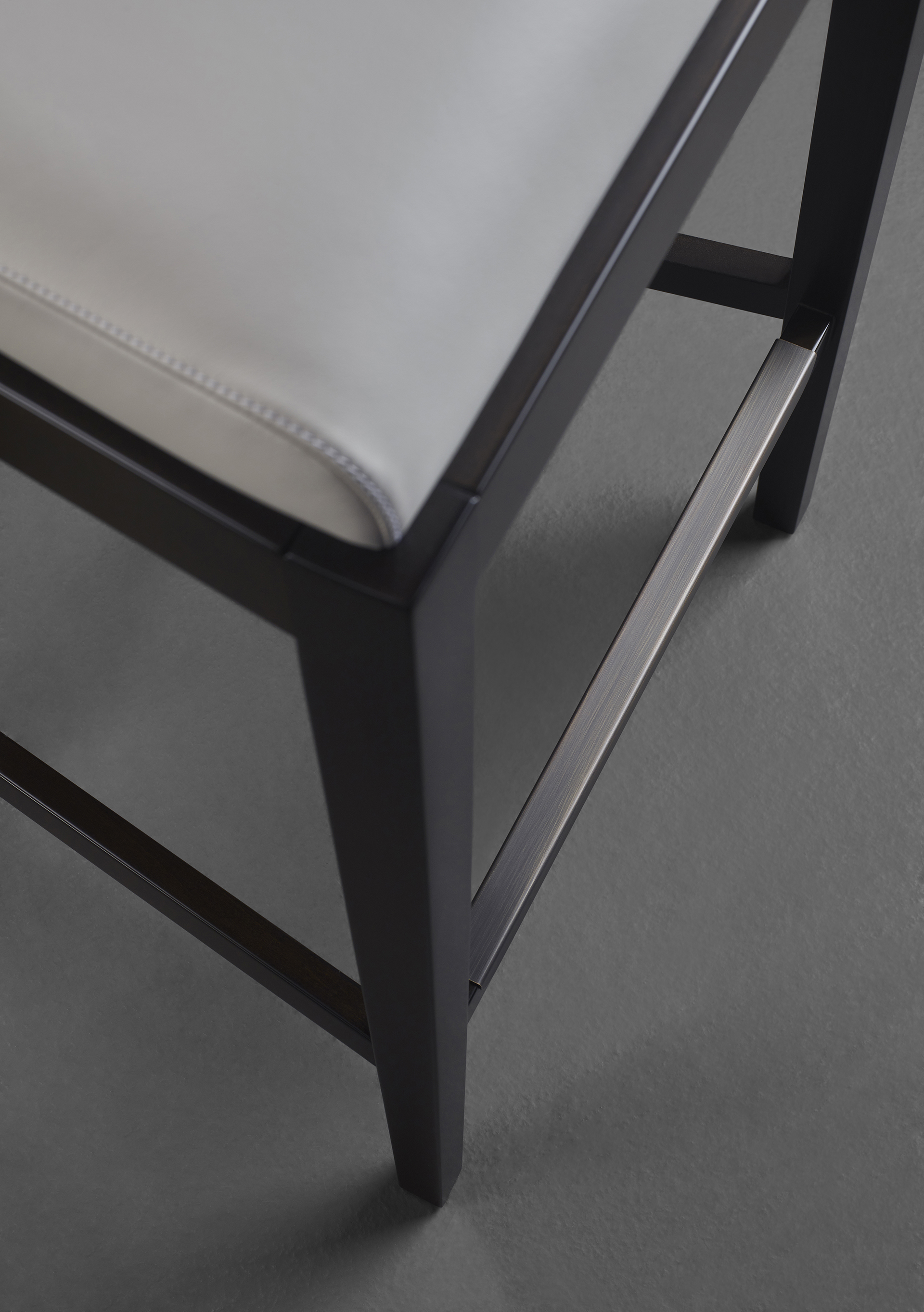Detail of Caffè, a wooden stool with straw back and fabric or leather seat, from Promemoria's catalogue | Promemoria