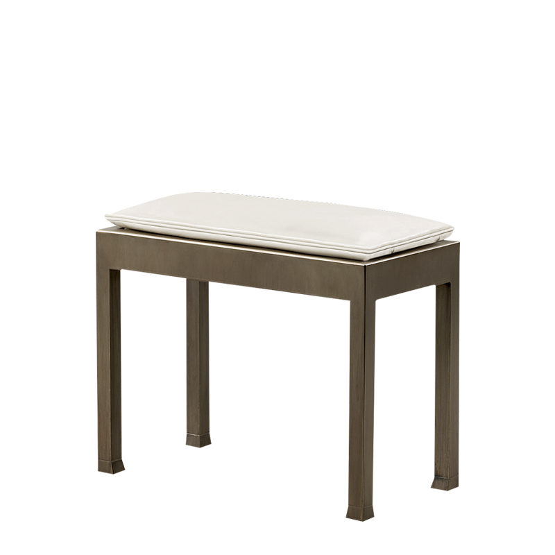 Gong is a bronze stool with a leather cushion, from Promemoria's catalogue | Promemoria