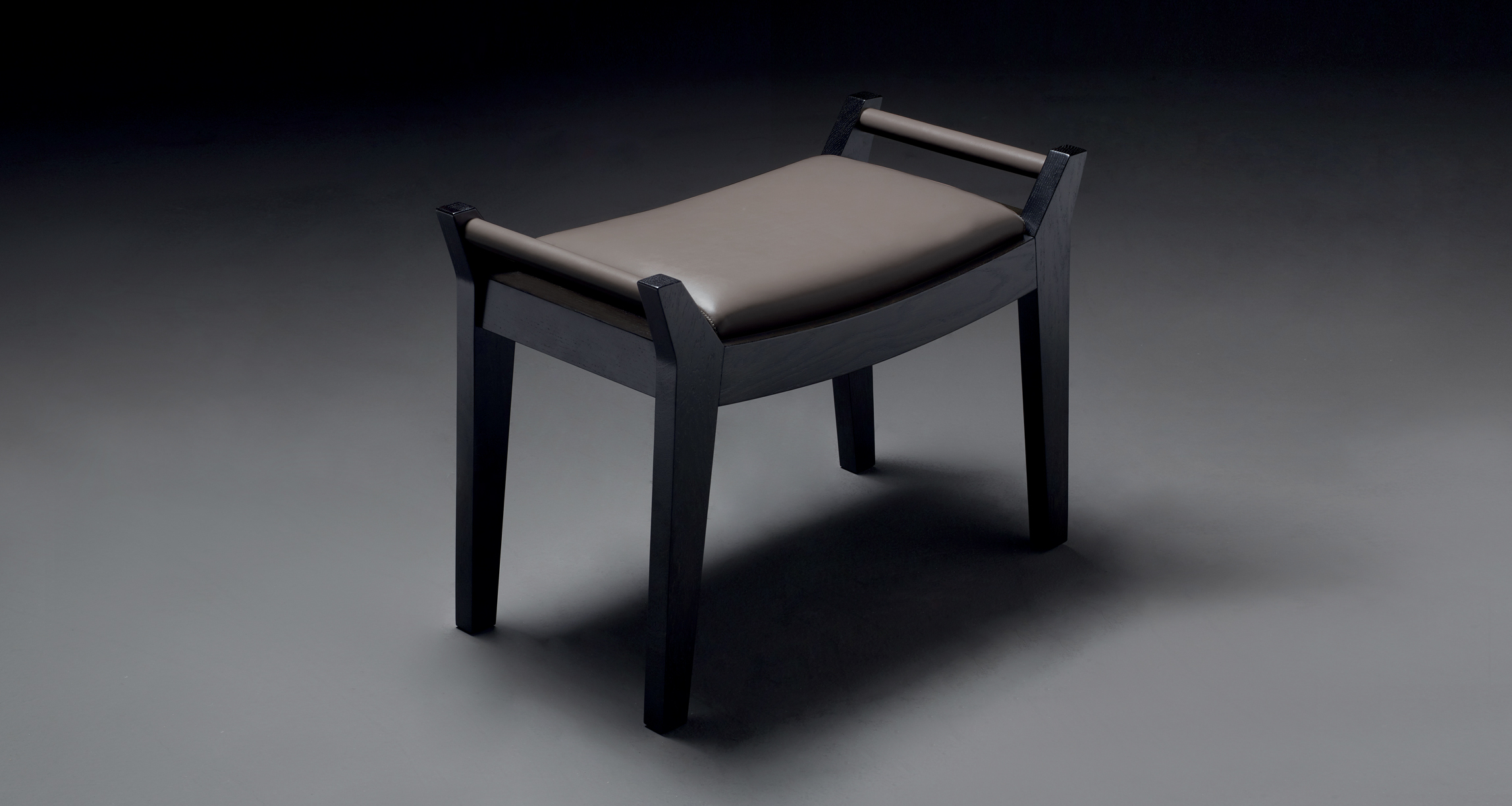 Jean is a wooden stool, leather seat from Promemoria's Amaranthine Tales collection | Promemoria