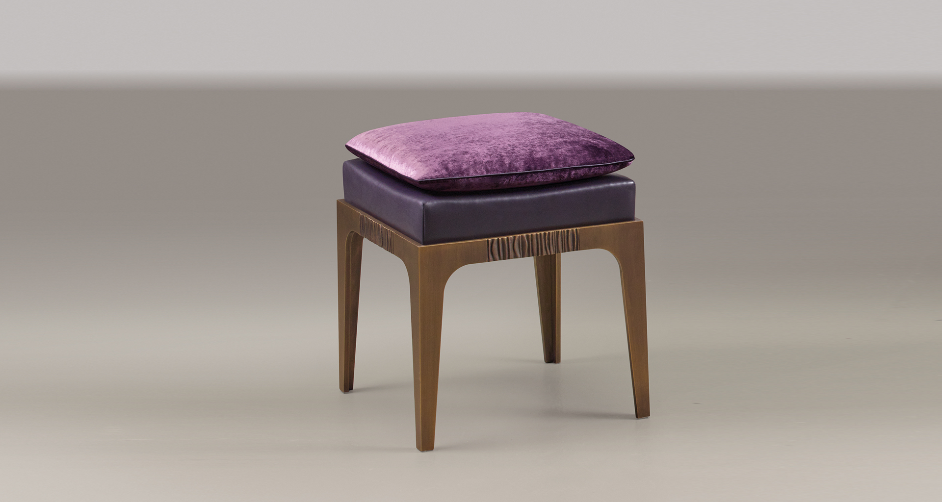 Montagu is a bronze stool with leather seat and fabric cushion, from Promemoria's The London Collection | Promemoria