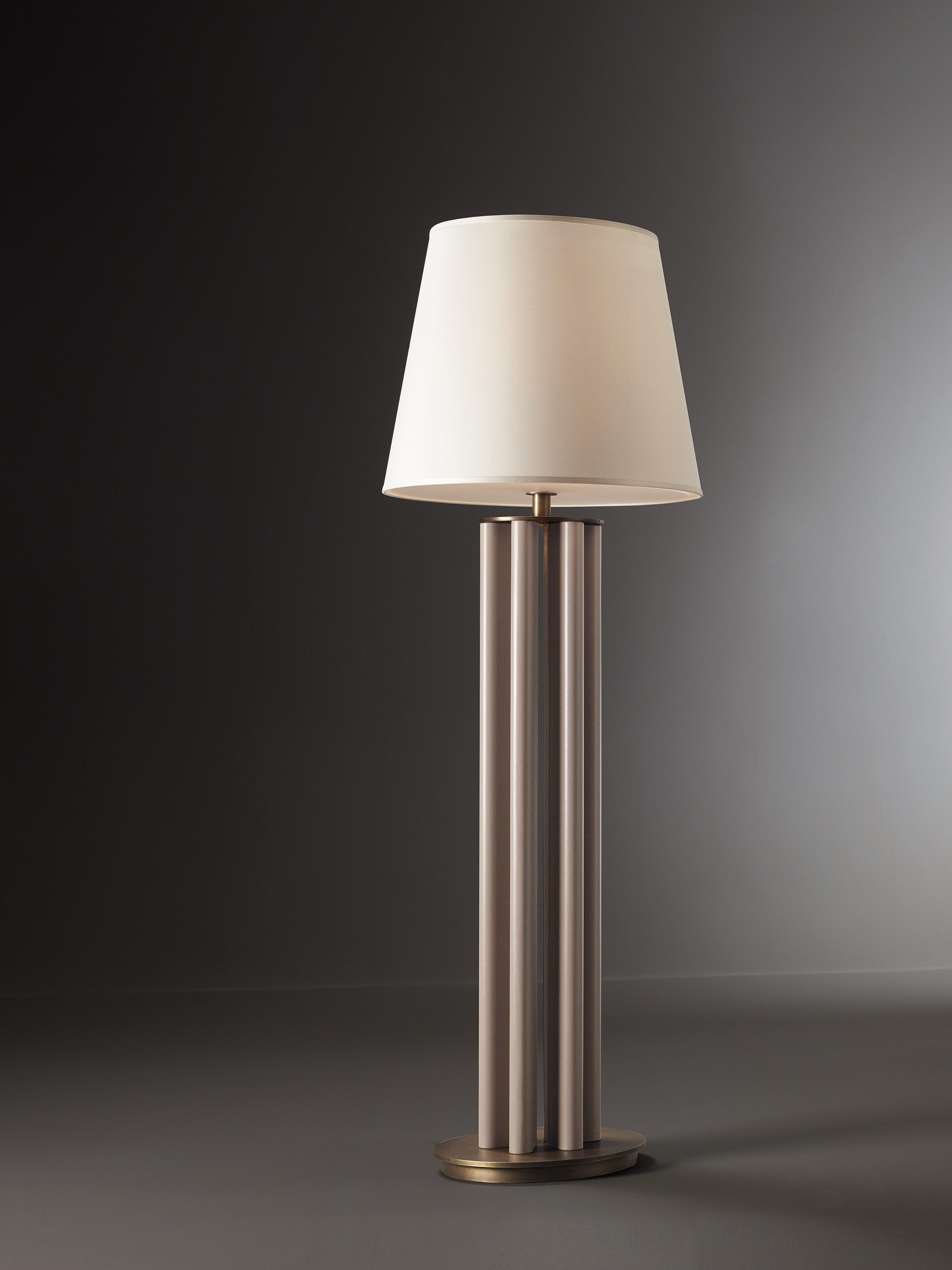 Clori is a floor LED lamp with leather or wooden structure, bronze base and details and linen, cotton or silk with handmade edge, from Promemoria's Amaranthine Tales collection | Promemoria