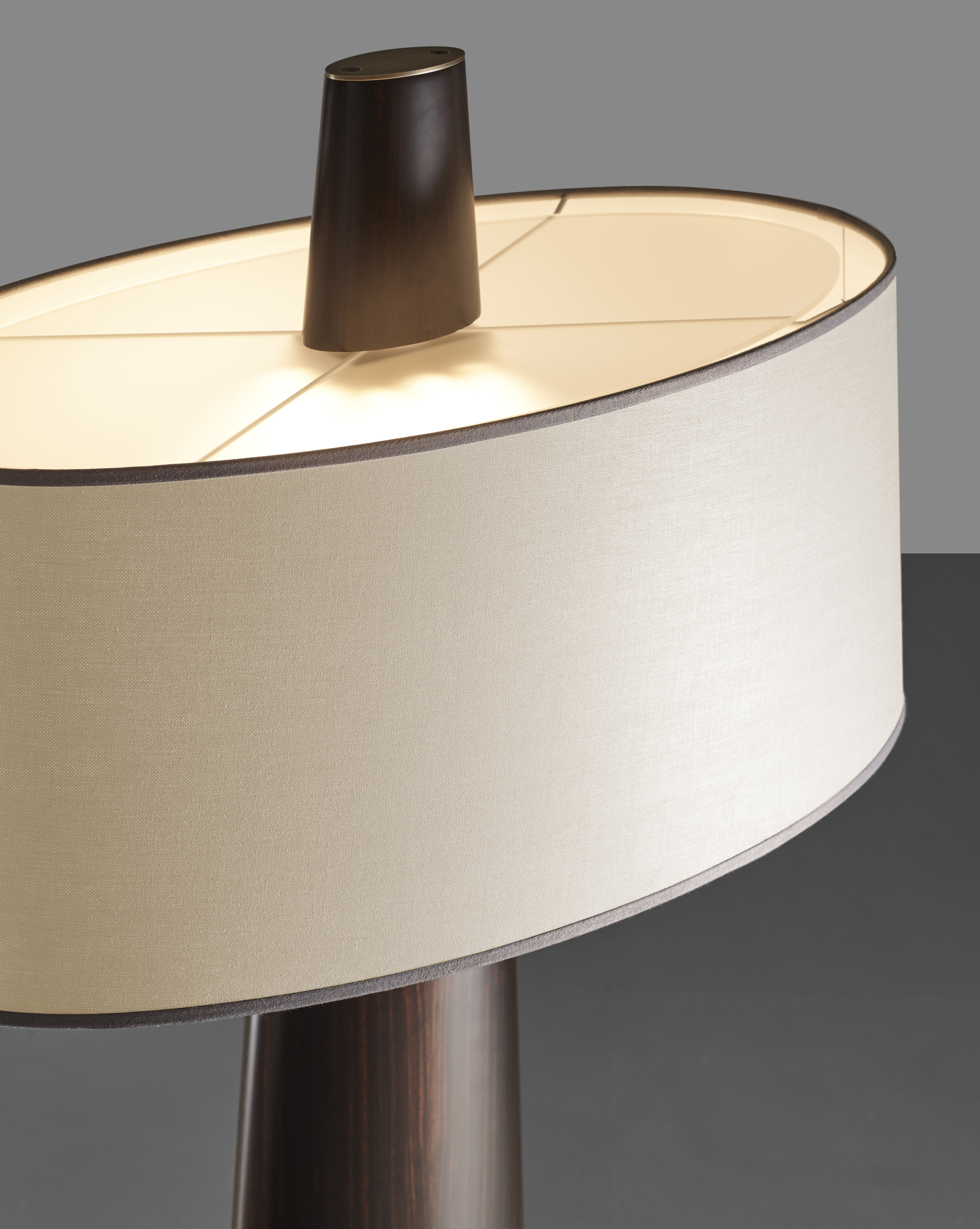 Detail of Fosca, a floor wooden LED lamp with a bronze base and a cotton, linen or hand-embroidered silk lampshade, from Promemoria's catalogue | Promemoria