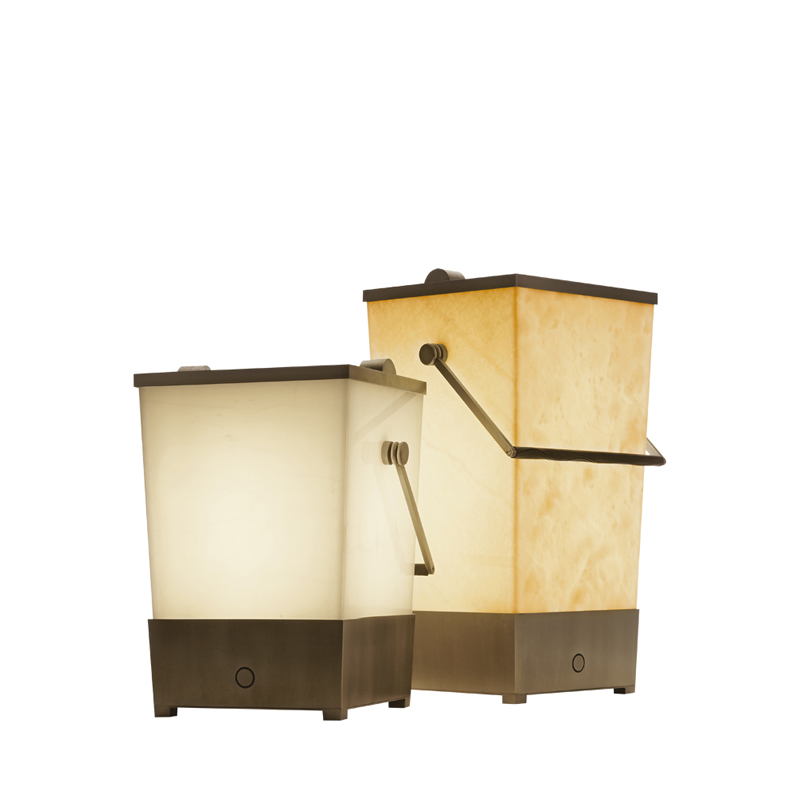Hara is a floor wireless LED lamp shaped like a bucket with a bronze handle covered in leather, from Promemoria | Promemoria
