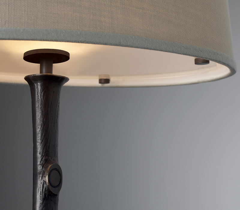 Detail of Françoise, a table LED lamp with bronze structure and linen, cotton or hand-broidered silk lampshade, from Promemoria's catalogue | Promemoria