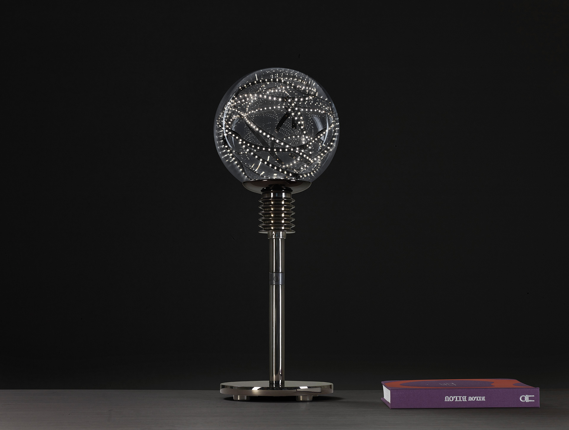 Higgs is a table LED lamp in metal with Murano glass diffuser availble in several colors, designed by Castglioni from Promemoria's catalogue | Promemoria