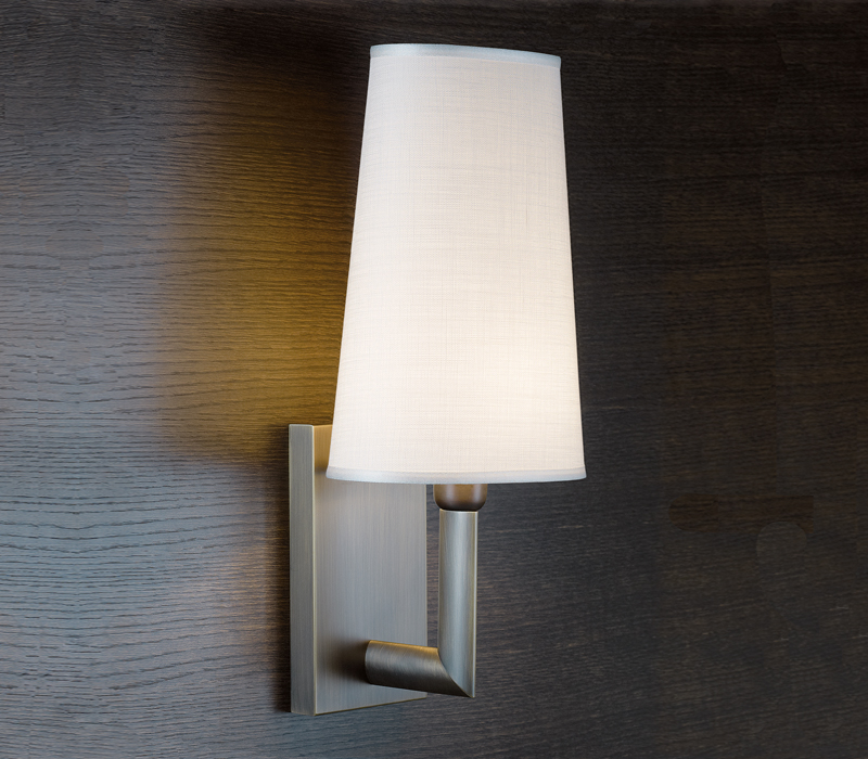 Rosa is a wall bronze LED lamp with a linen, cotton or silk lampshade with handmade edge, from Promemoria's catalogue | Promemoria