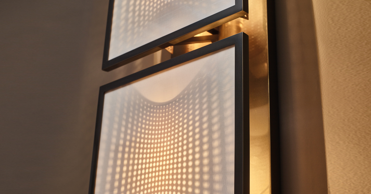 Teresa is a modular bronze wall lamp with a glass diffuser with linen, cotton or silk insert, from Promemoria's catalogue | Promemoria