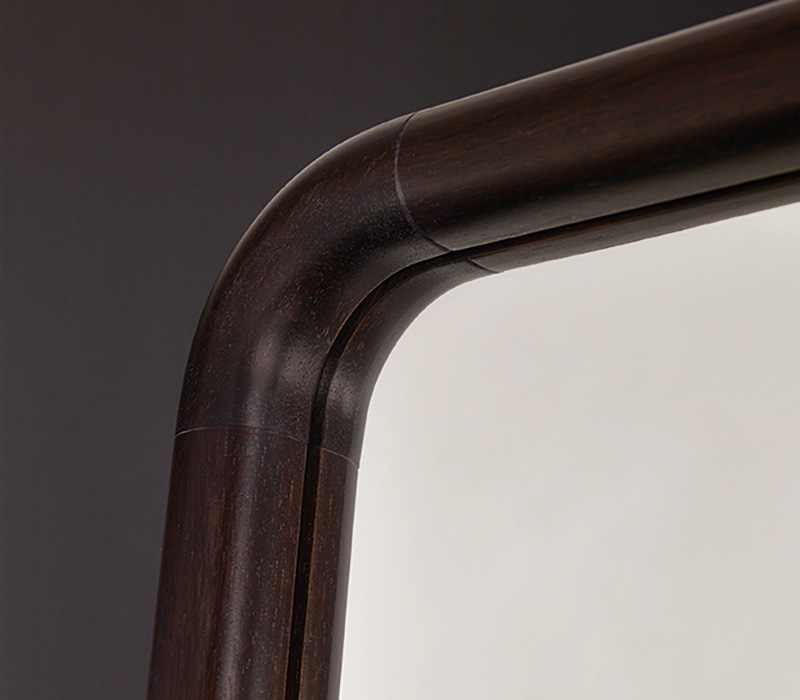 Detail of Ey-de-Net, a wall mirror with a wooden frame or completely covered in leather, that belongs to the Night Tales collection of Promemoria | Promemoria