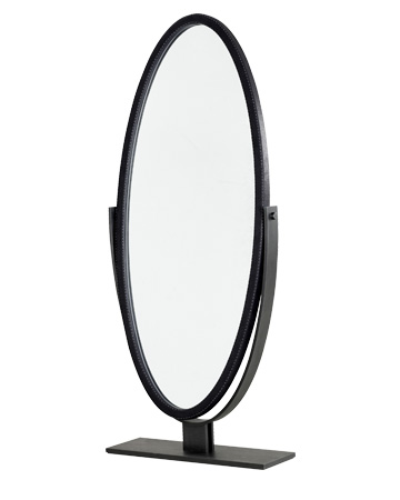 Ingrid is an elliptical revolving mirror with a bronzed metal base, from the Promemoria's catalogue | Promemoria