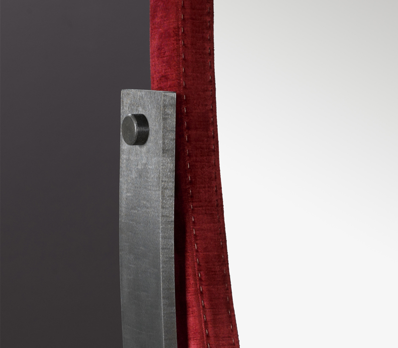 Detail of Ingrid, an elliptical revolving mirror with a bronzed metal base, from the Promemoria's catalogue | Promemoria