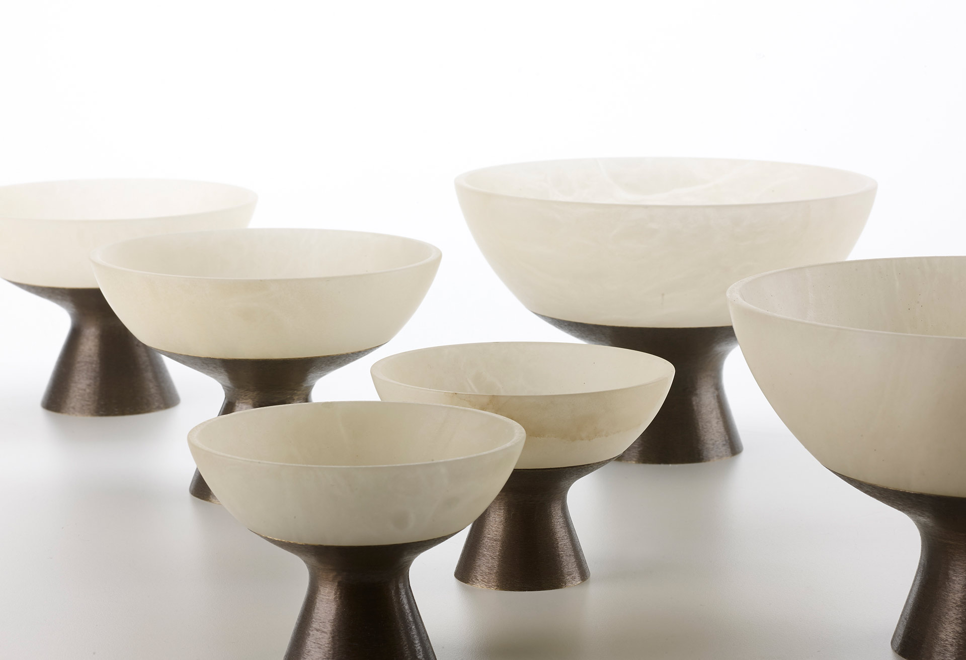 Coppetta is a bronze and alabaster vase, also available in alabaster from Promemoria's catalogue | Promemoria