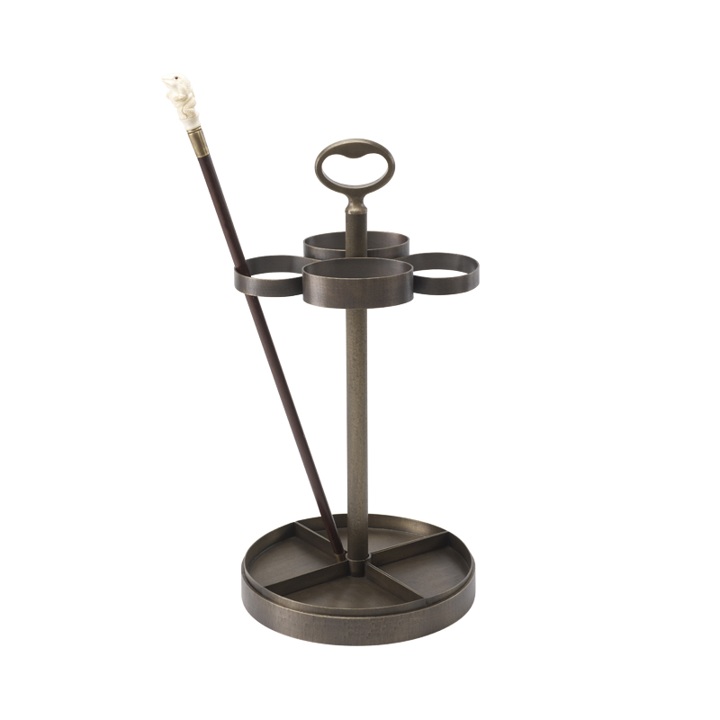 Fred is a bronze umbrella stand from Promemoria's catalogue | Promemoria