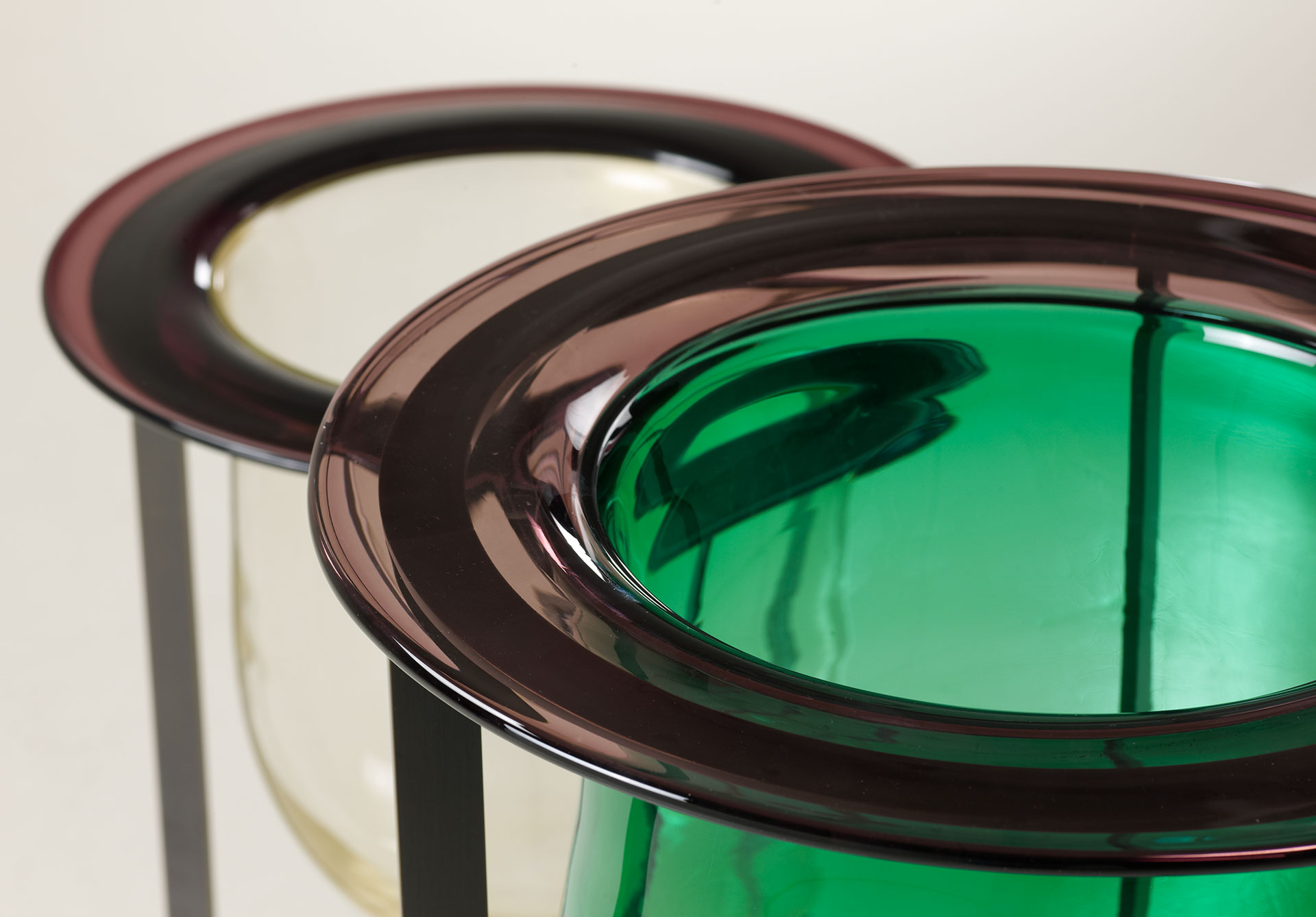 Detail of Vaso Canaletto, a Murano glass vase with bronze and Murano glass structure, available in different colors, from Promemoria's catalogue | Promemoria