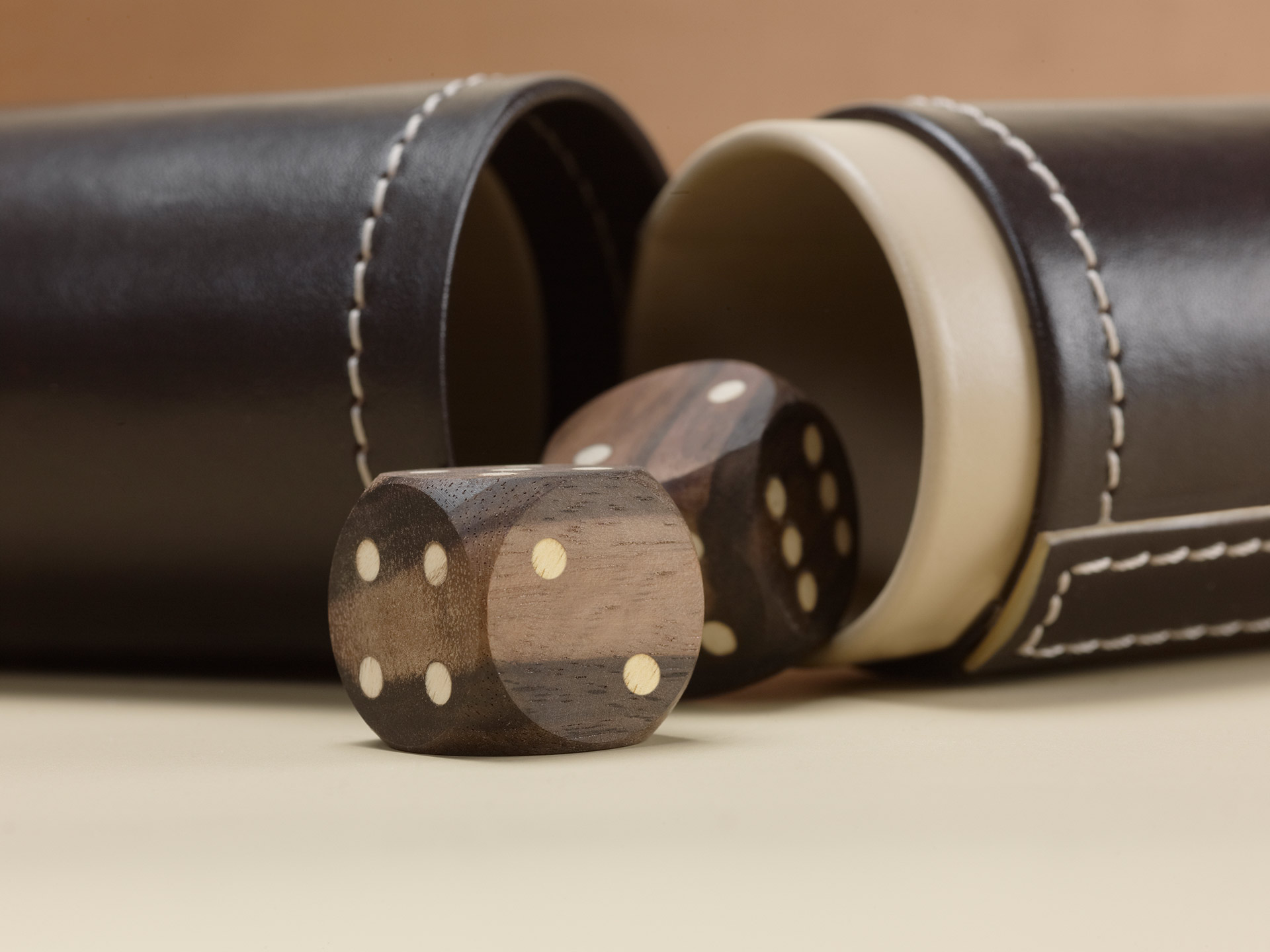 Wooden game sets of dice, checkers, dominoes and chess, available with leather box, from Promemoria's catalogue | Promemoria