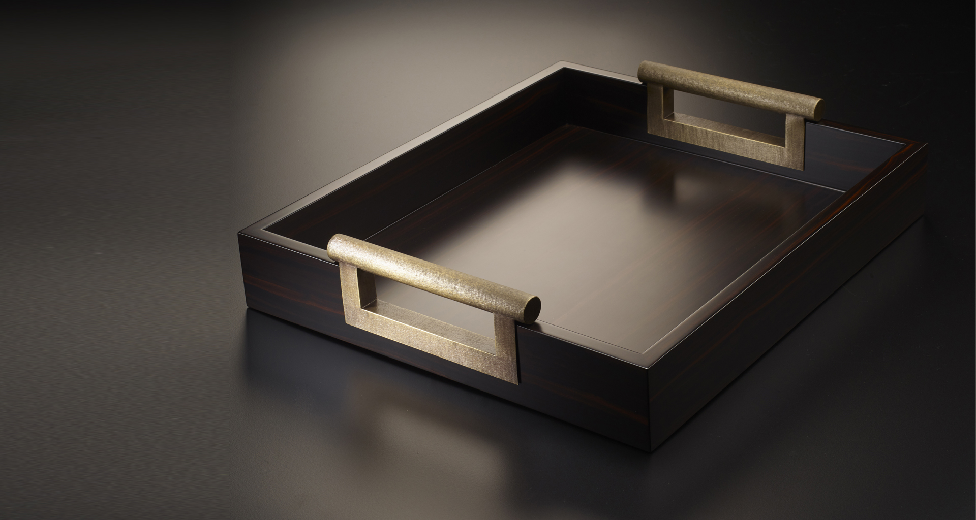 Alfred is a wooden tray with bronze handles, from Promemoria's catalogue | Promemoria