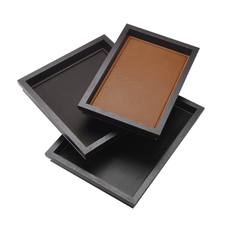 Ambrogio is a wooden tray with a leather placemat from Promemoria's catalogue | Promemoria
