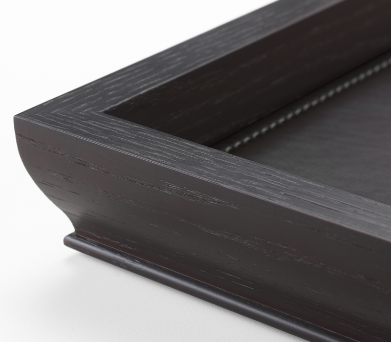 Detail of Ambrogio, a wooden tray with a leather placemat from Promemoria's catalogue | Promemoria