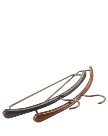 Gruccia is a leather and bronze wardrobe hanger, from Promemoria's catalogue | Promemoria