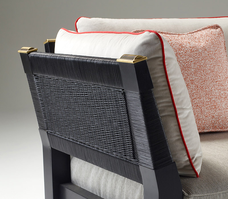 Detail of Moltrasio, an outdoor wooden chaise longue-dormeuse covered in fabric or leather with bronze details, from Promemoria's outdoor catalogue | Promemoria