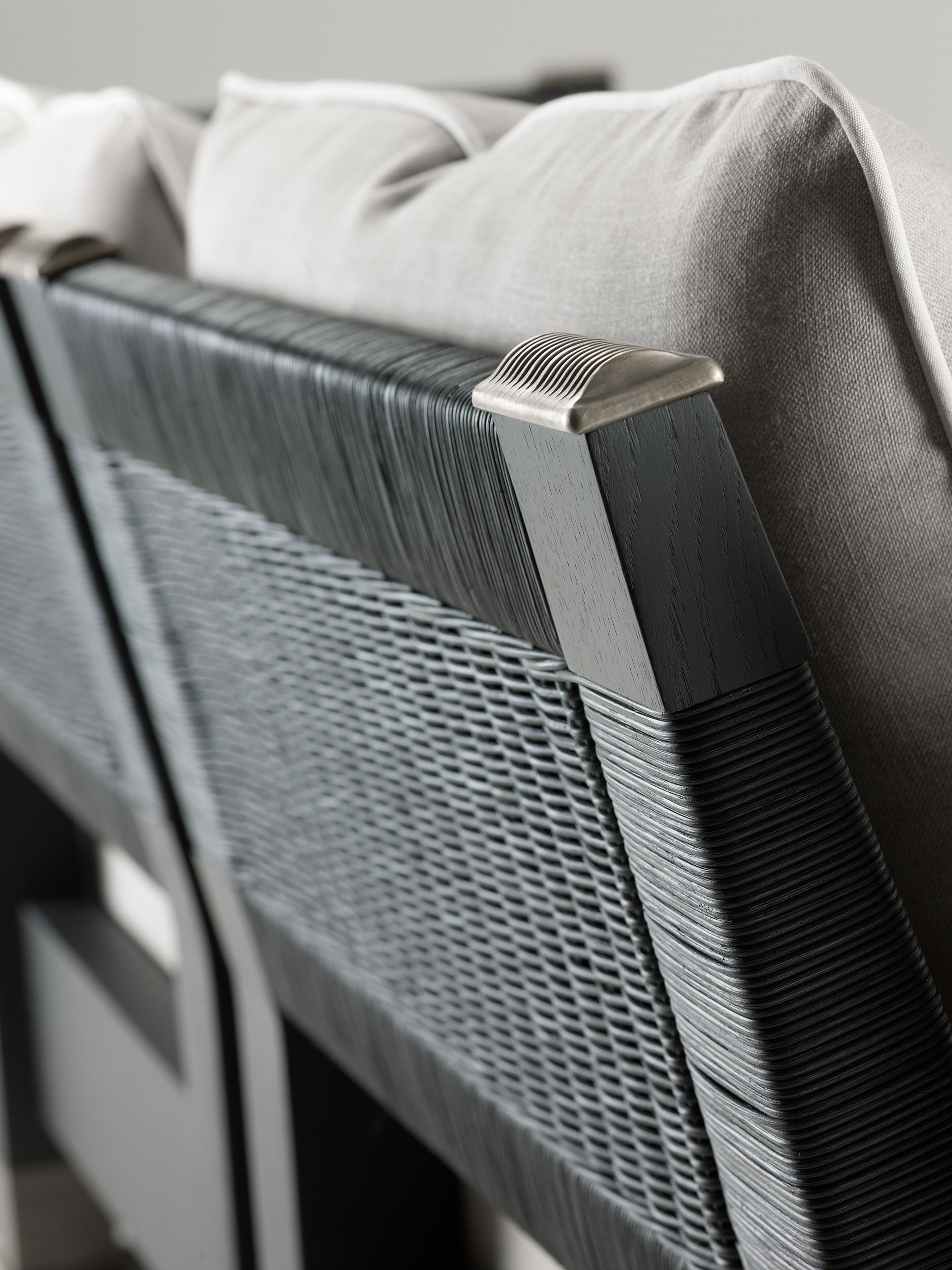 Moltrasio is an outdoor wooden sofa with bronze feet and details, from Promemoria's outdoor catalogue | Promemoria