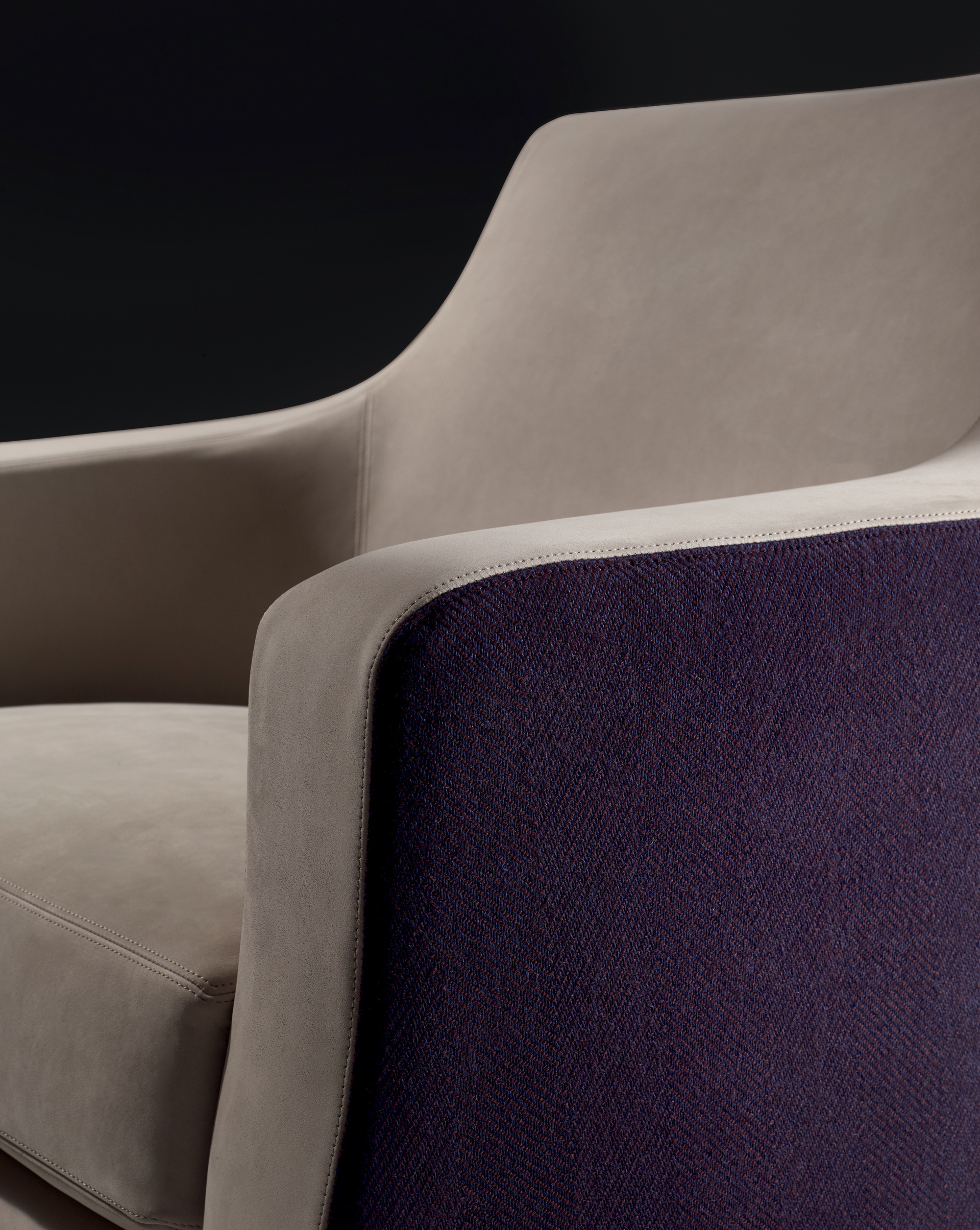 Aziza is a wooden armchair covered in fabric or leather, from Promemoria's catalogue | Promemoria